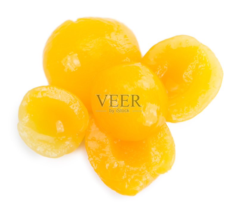 白色背景下的腌杏照片摄影图片