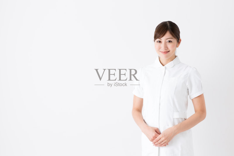 年轻亚洲护士的肖像孤立在白色背景正版图片素材