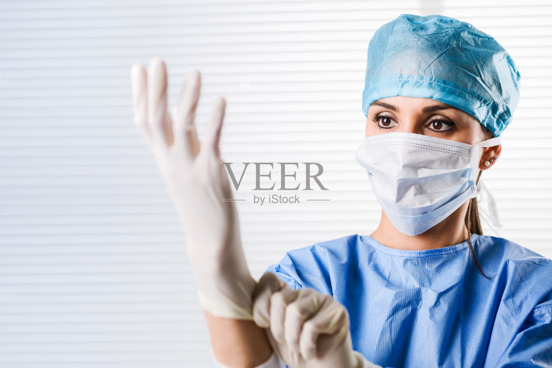 女医生外科医生戴着外科手套正版图片素材