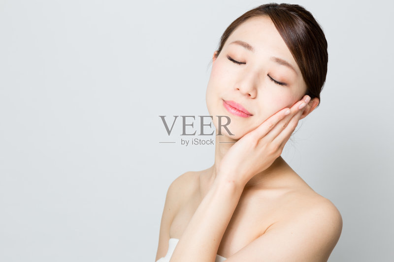 迷人的亚洲女性美丽图像孤立在灰色背景正版图片素材