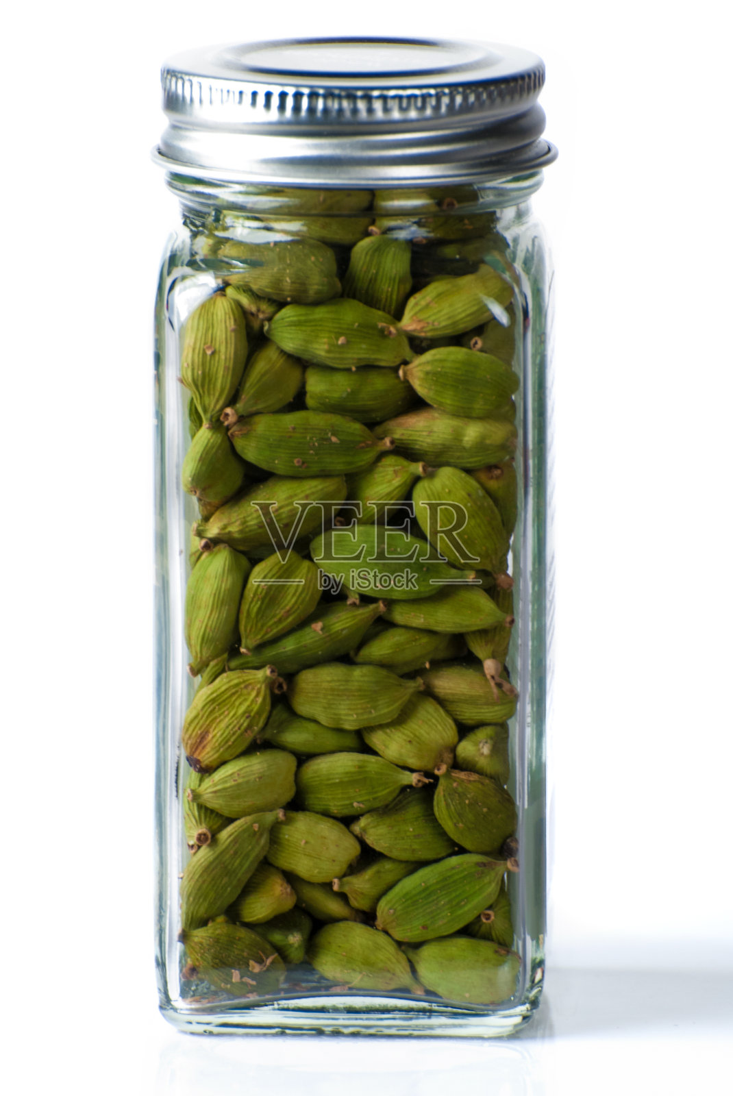 一瓶小豆蔻照片摄影图片