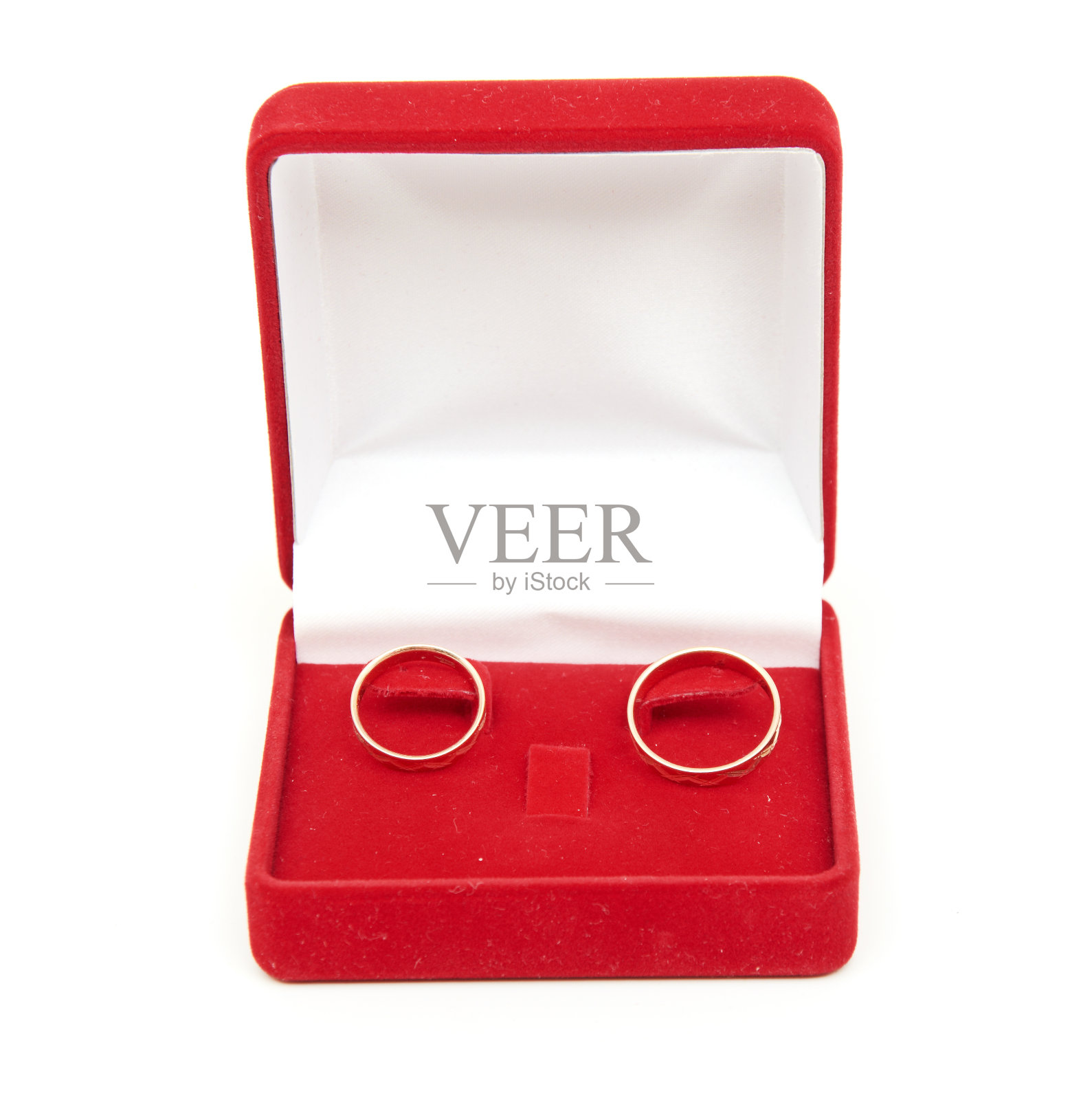 红盒子上的结婚戒指照片摄影图片