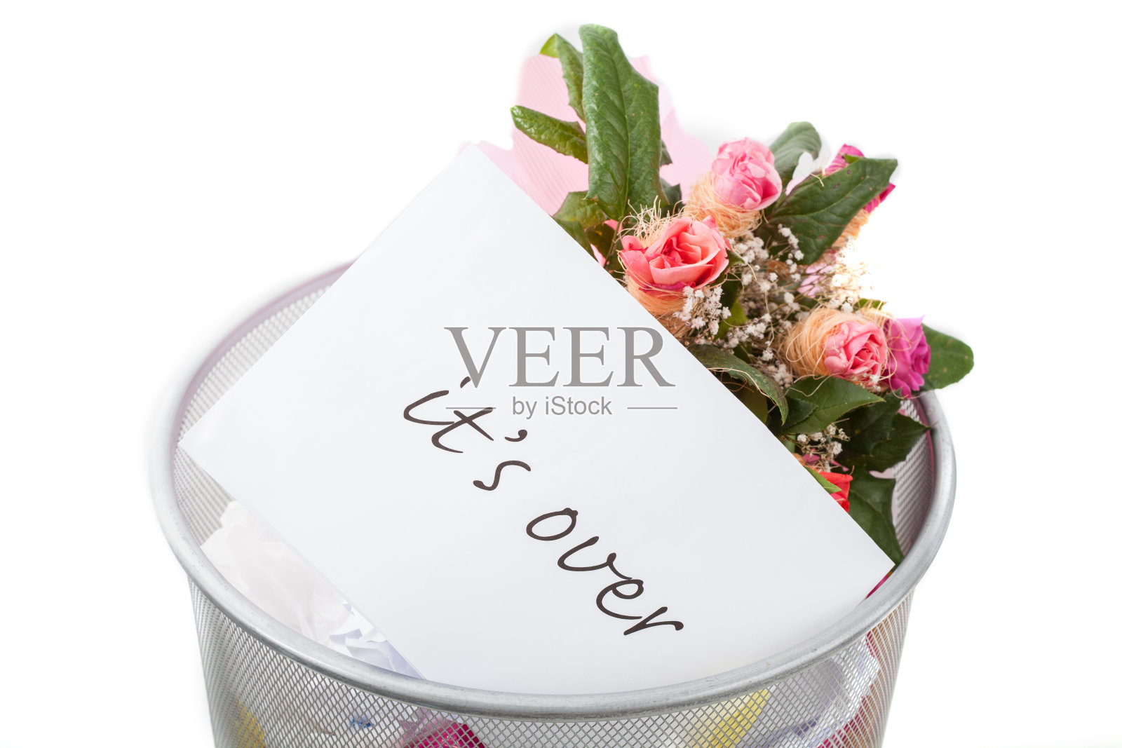 玫瑰，垃圾桶里有多余的字条照片摄影图片