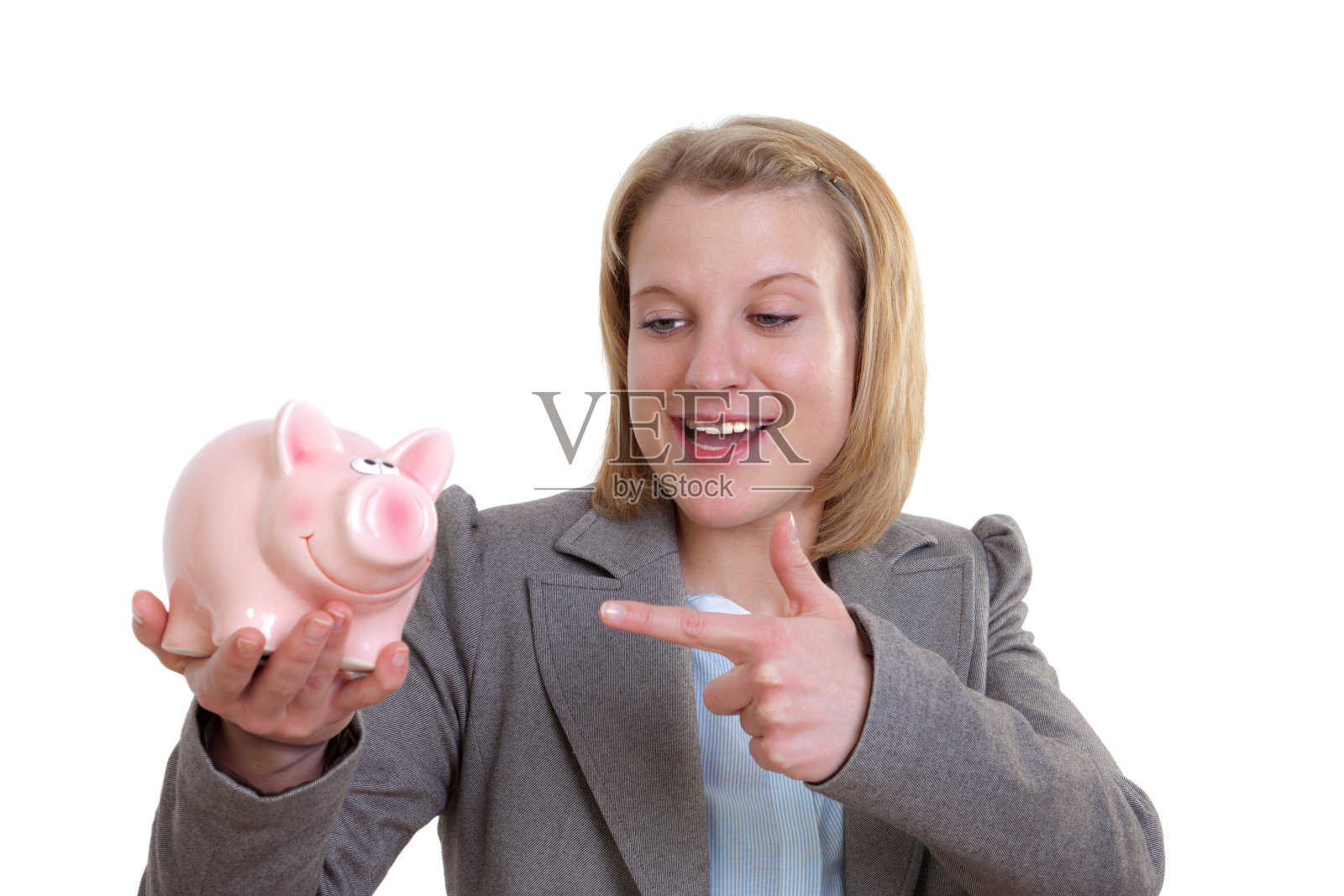 有存钱罐的年轻漂亮女人照片摄影图片