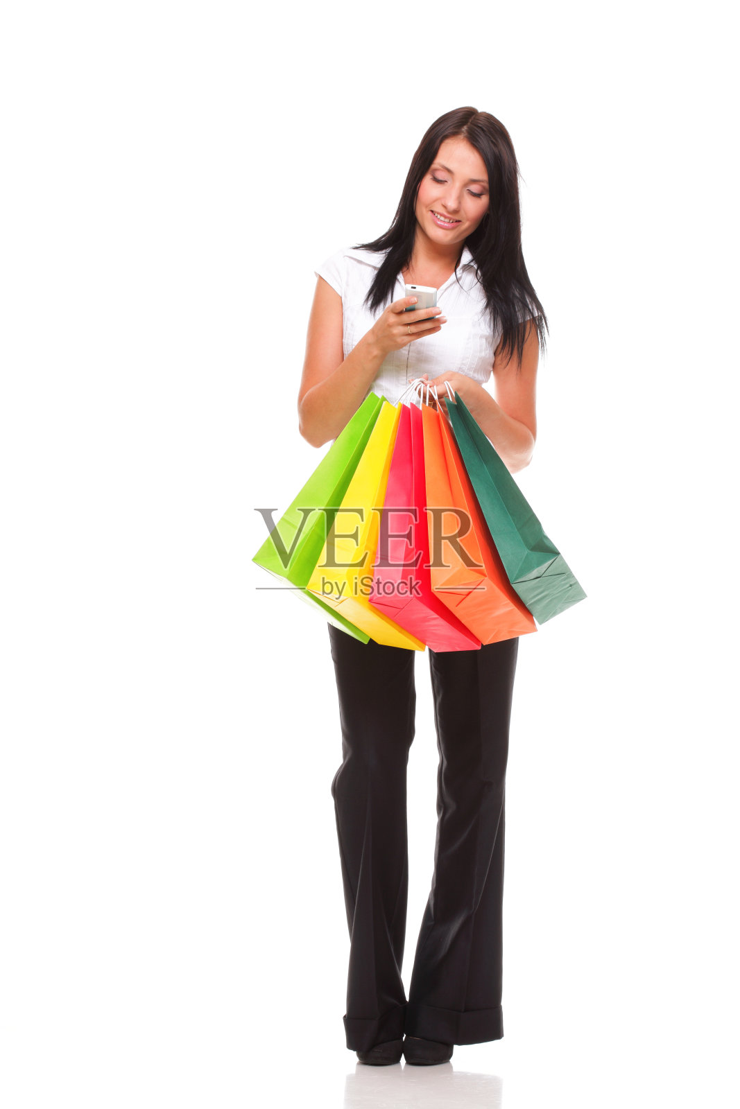 肖像可爱的年轻女子手持手机购物ba照片摄影图片