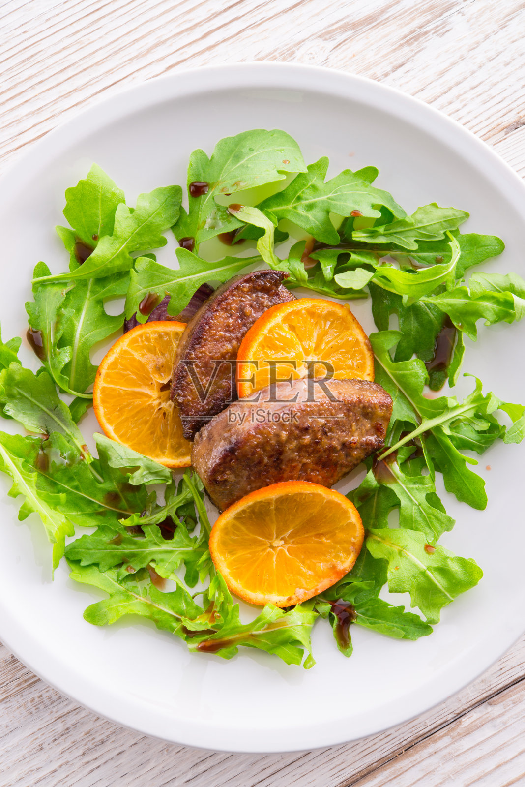 肝配洋葱橙汁照片摄影图片