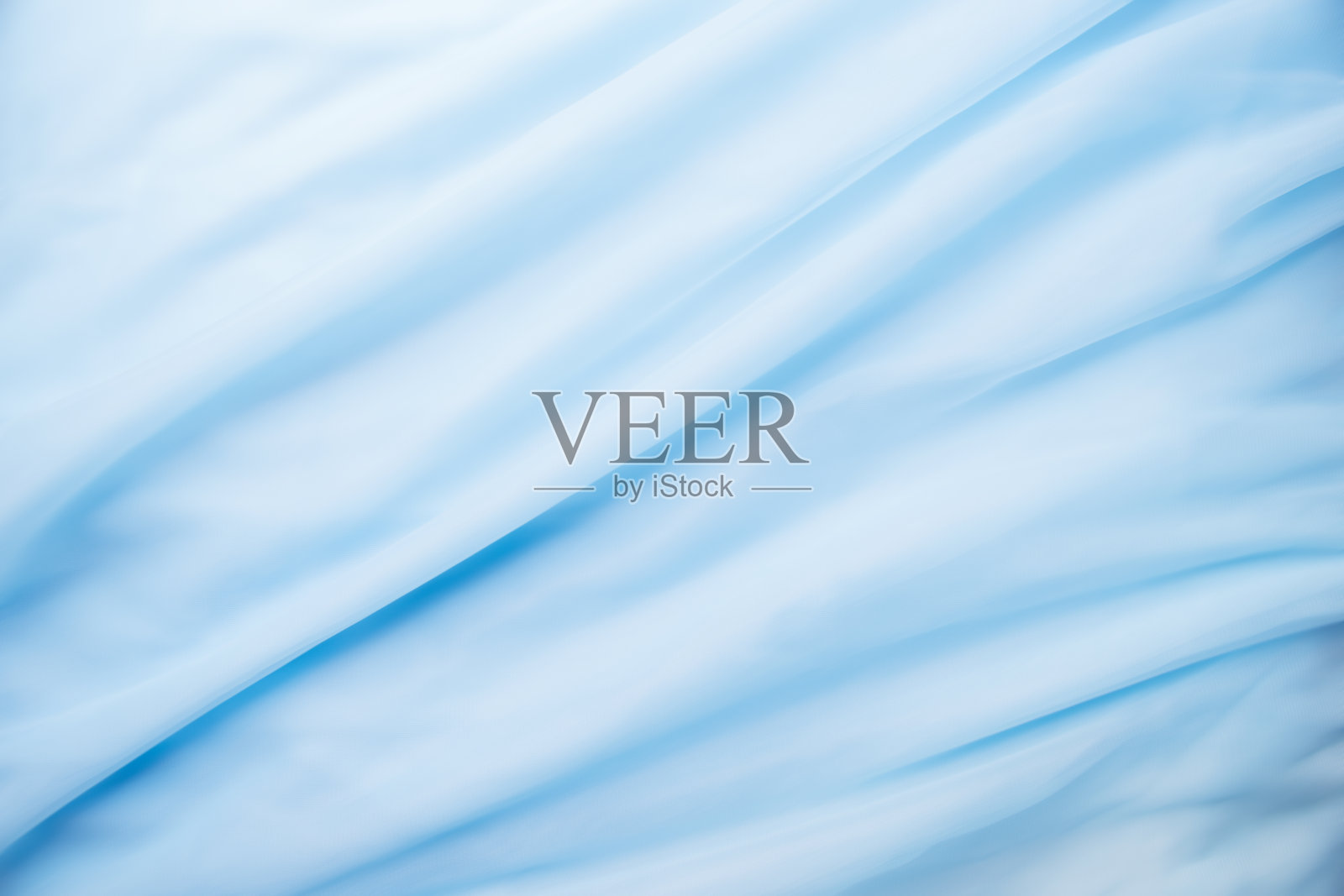 光滑典雅的蓝色面料可以用作背景照片摄影图片