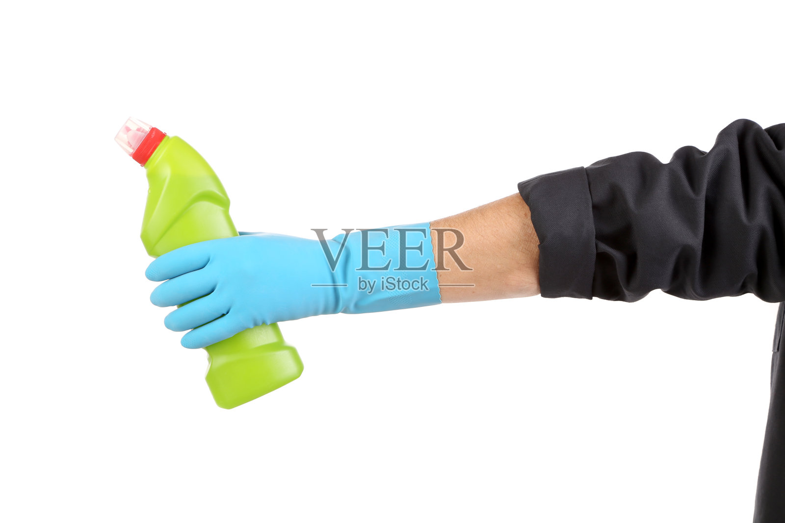 手套里的手拿着瓶子。照片摄影图片