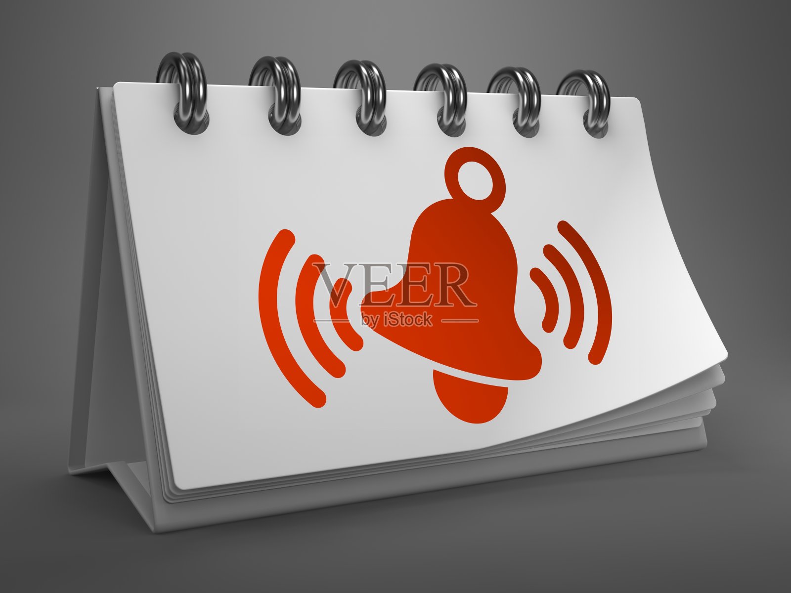 桌面日历与红色铃声图标。照片摄影图片