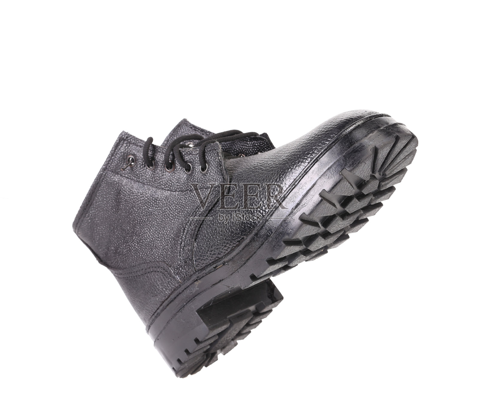 黑色的皮靴。照片摄影图片