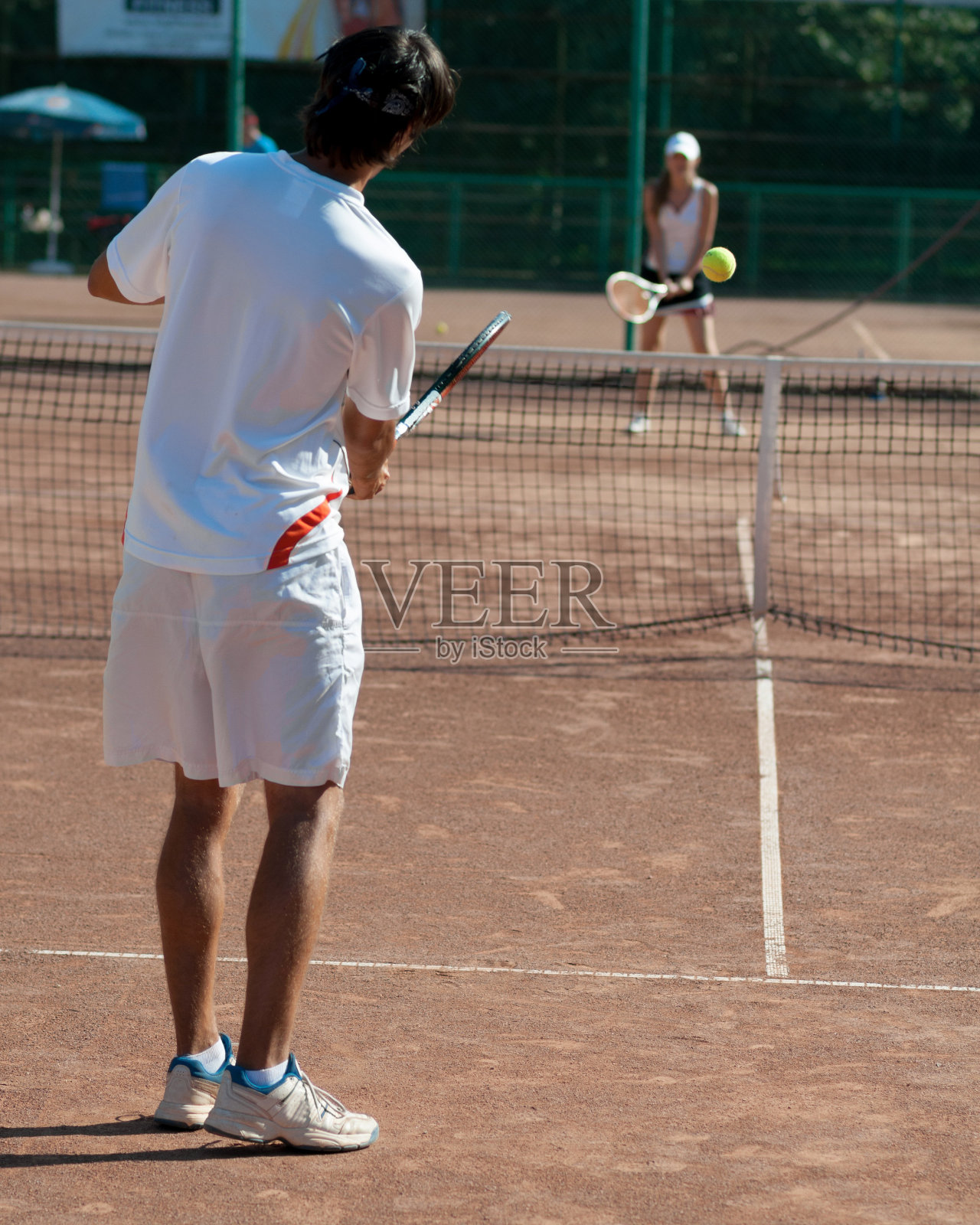 网球教练照片摄影图片