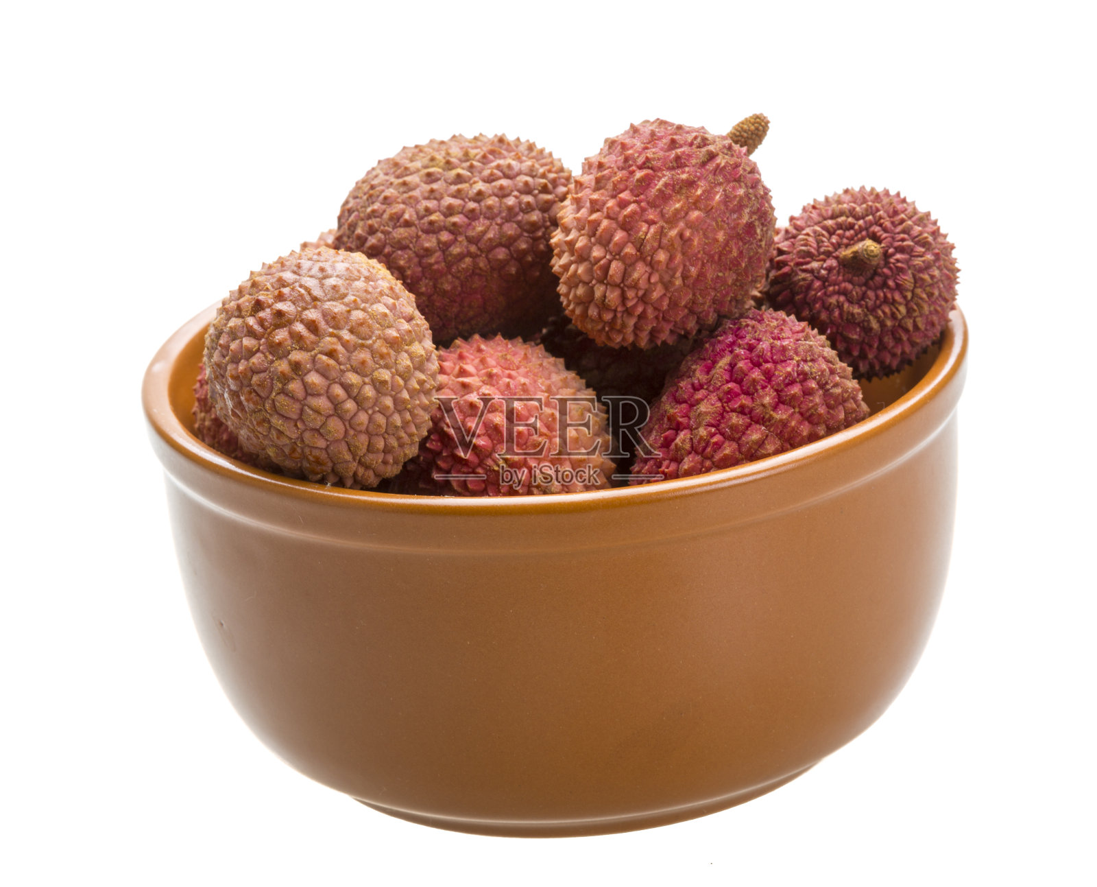 白色背景下碗里水果的特写镜头照片摄影图片