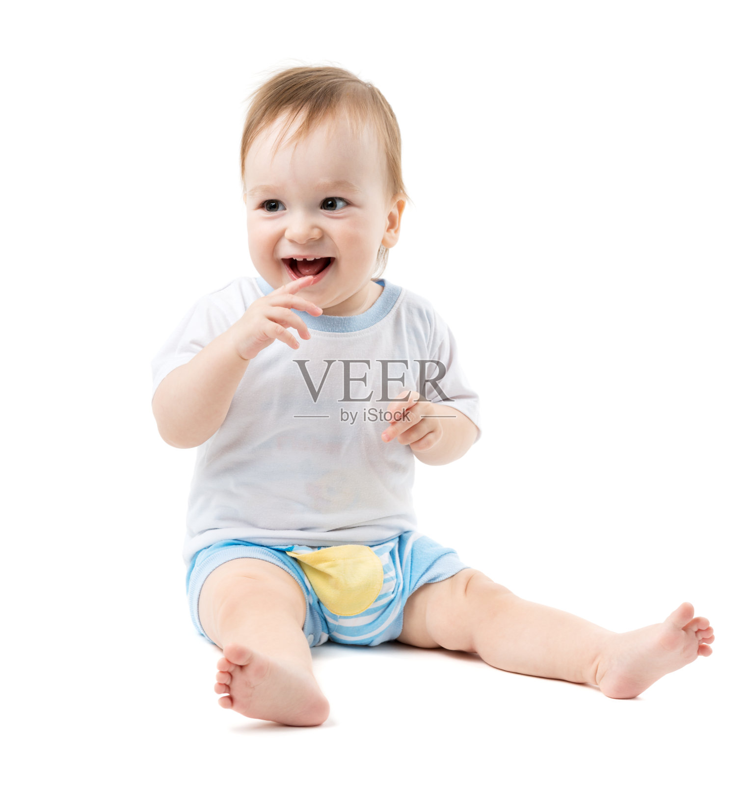 婴儿坐着，笑着照片摄影图片