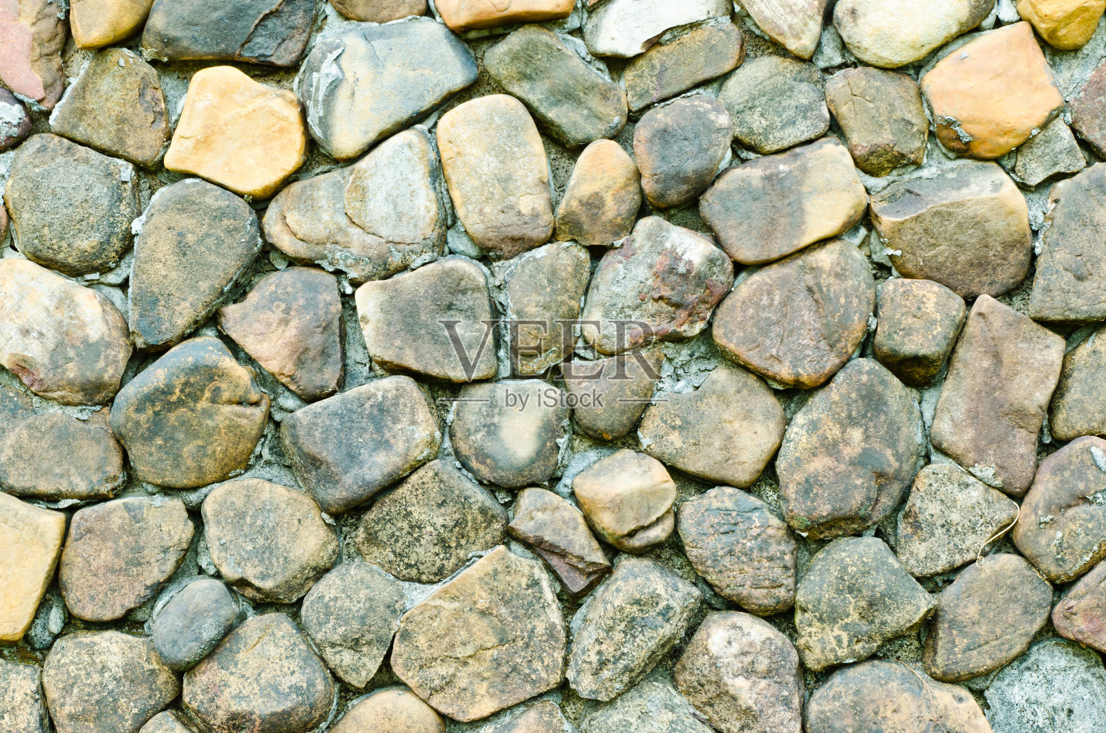 特写粗糙的大岩石墙为背景照片摄影图片