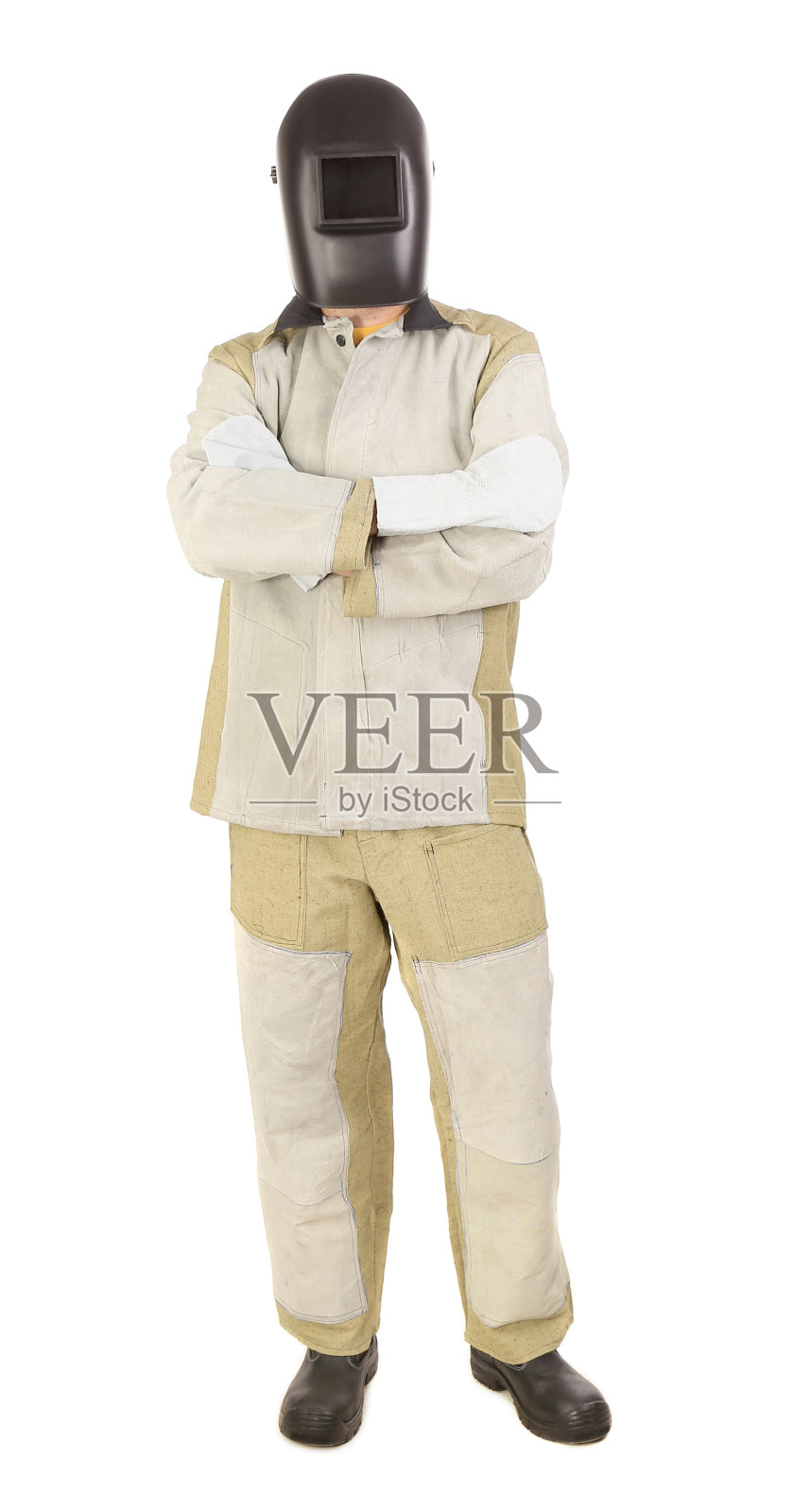 自信的焊工在面具。照片摄影图片