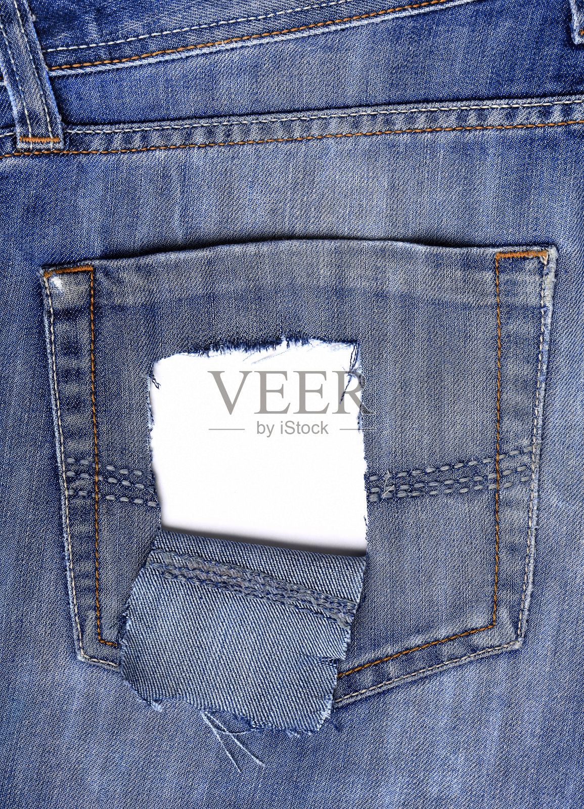 牛仔裤后口袋漏水照片摄影图片