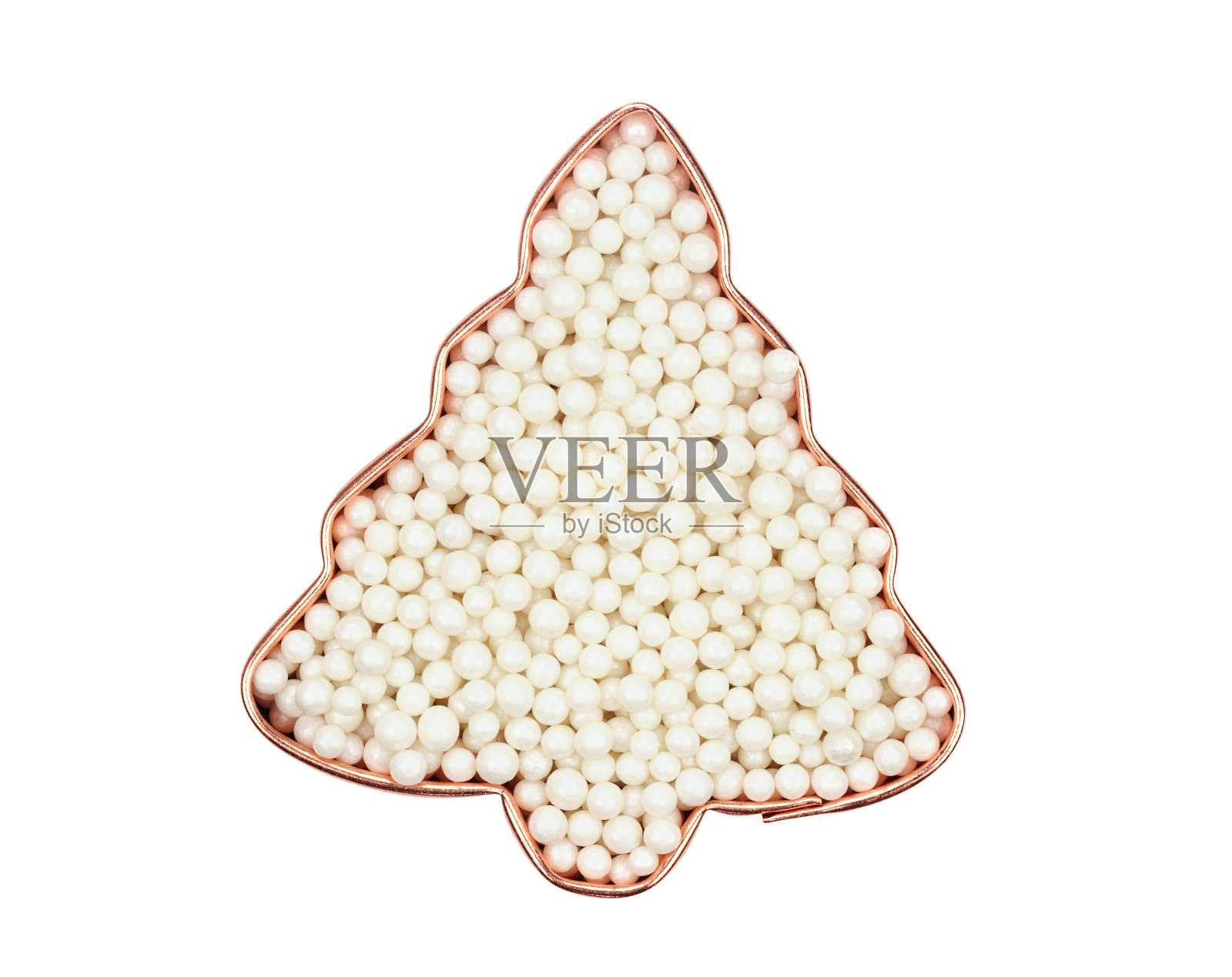 圣诞饼干切割机与珍珠糖果照片摄影图片