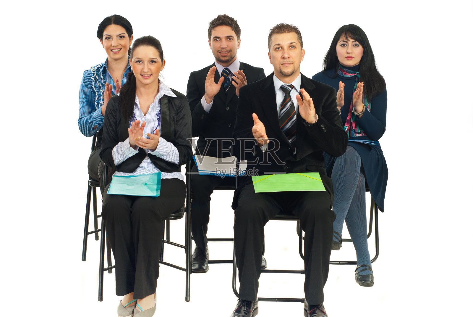 商界人士在会议上鼓掌照片摄影图片