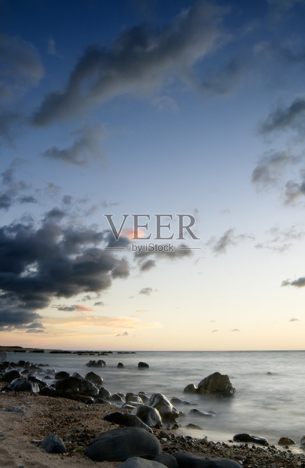 珊瑚礁海岸线的日落照片摄影图片