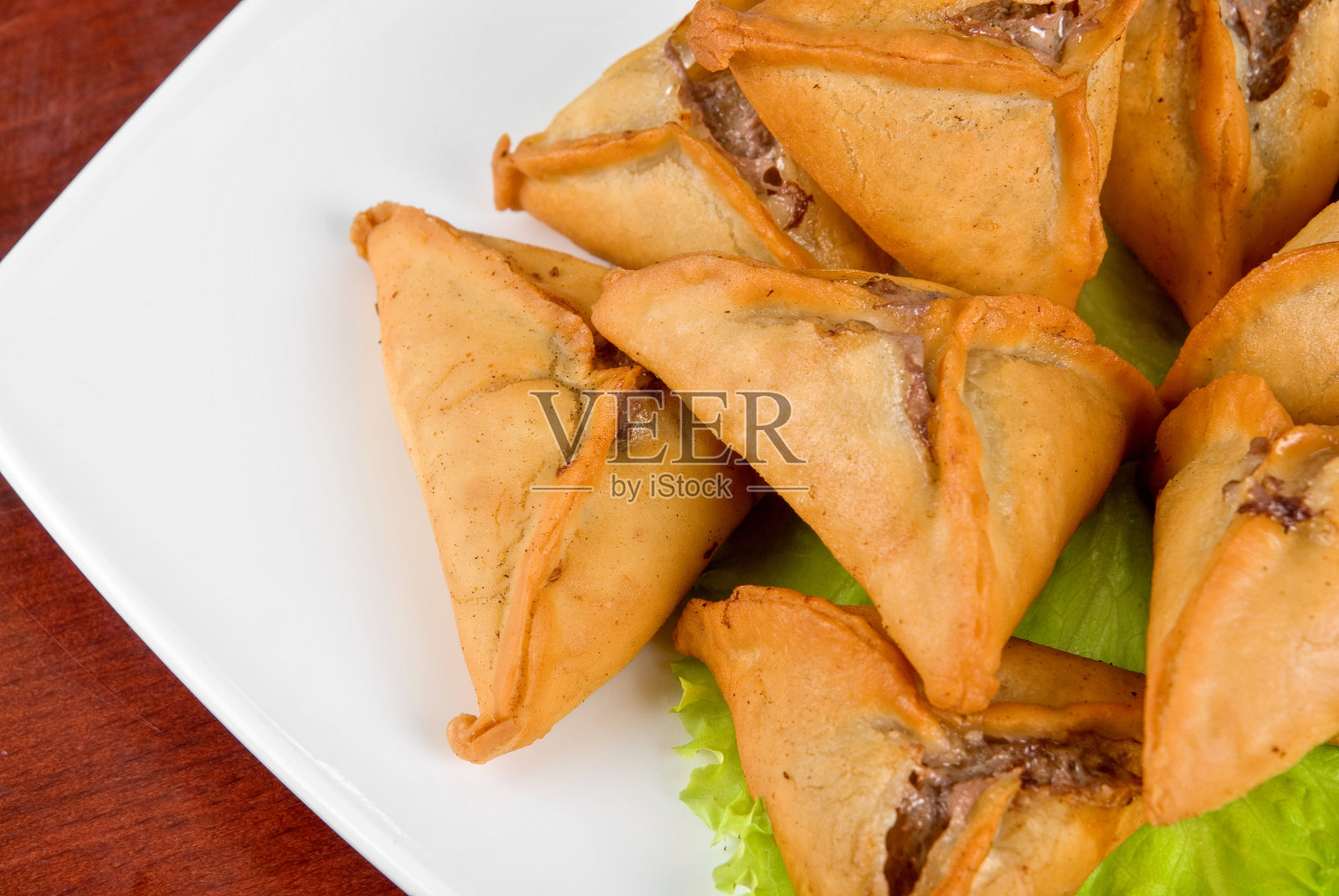 肉烤饺子照片摄影图片