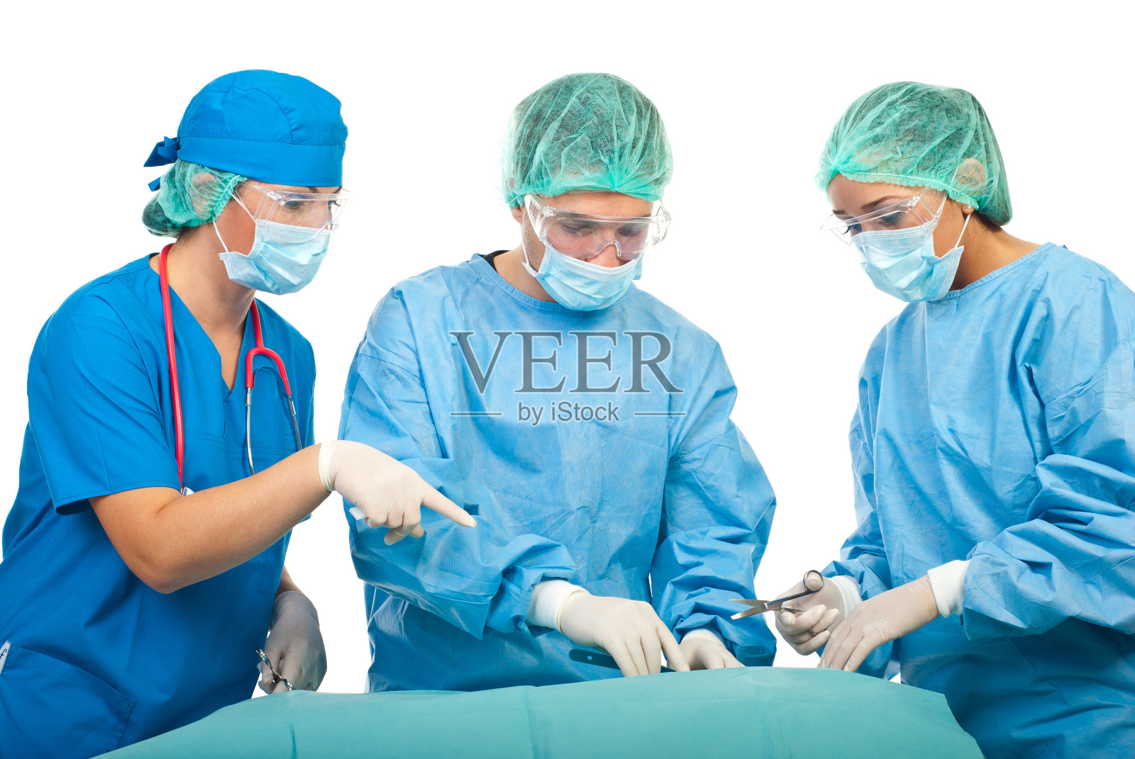 三个外科医生在手术室照片摄影图片