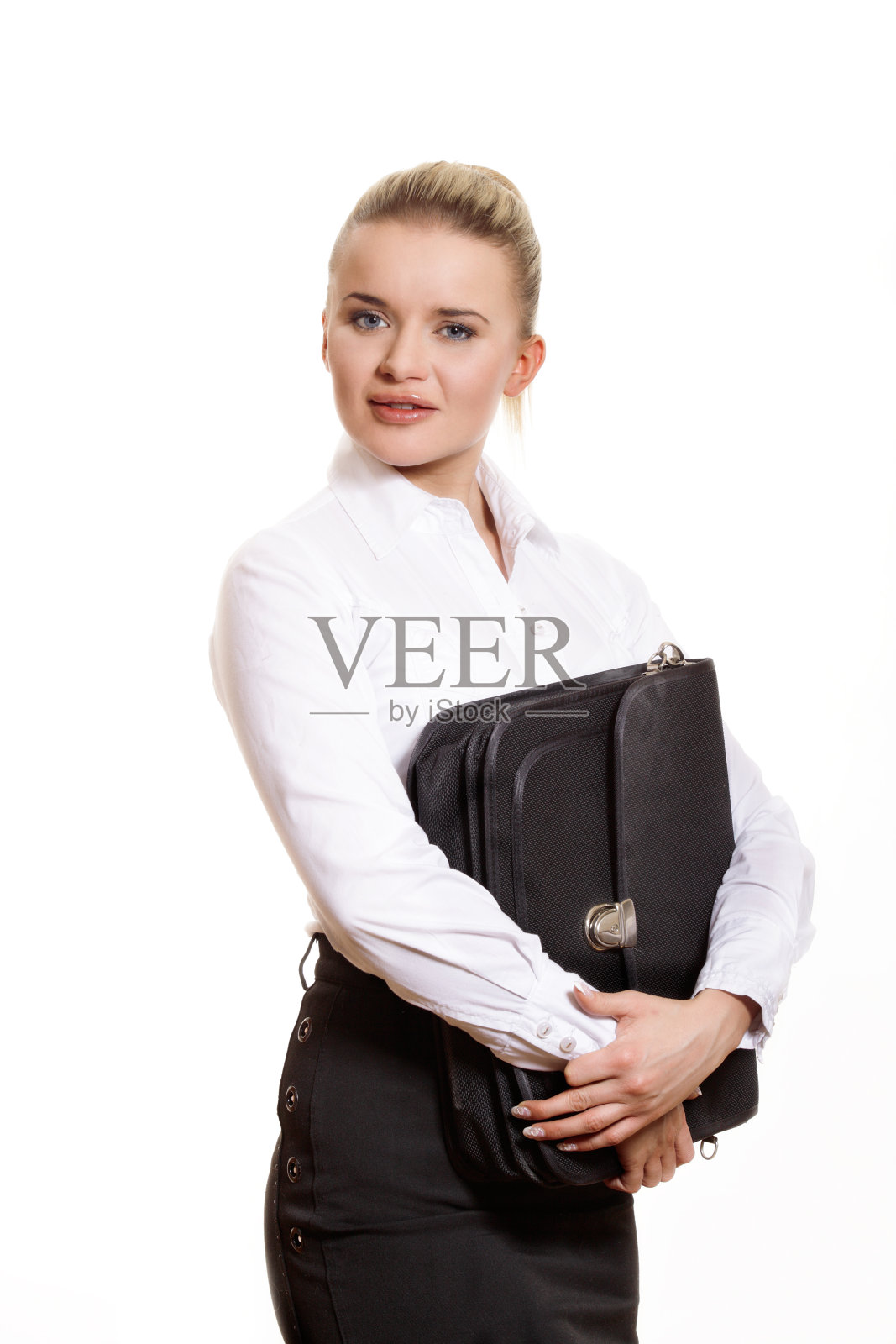 自信的女商人拿着公文包。照片摄影图片