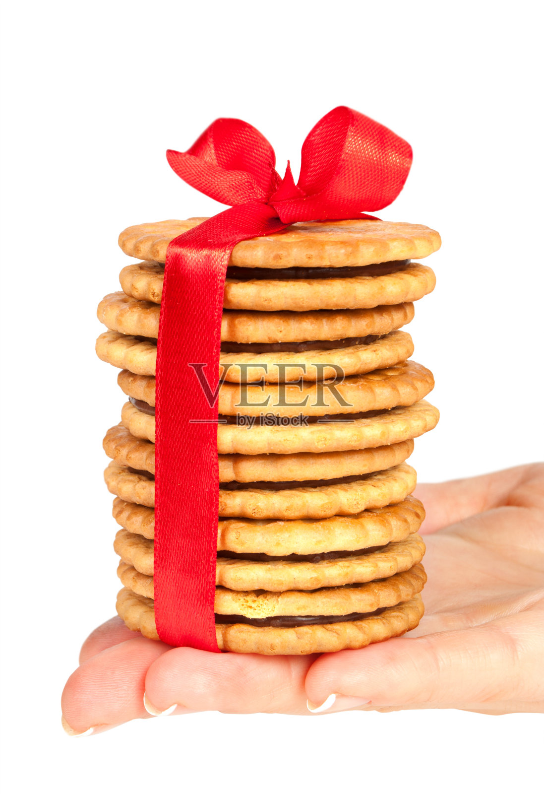 一堆带着丝带和蝴蝶结的饼干照片摄影图片