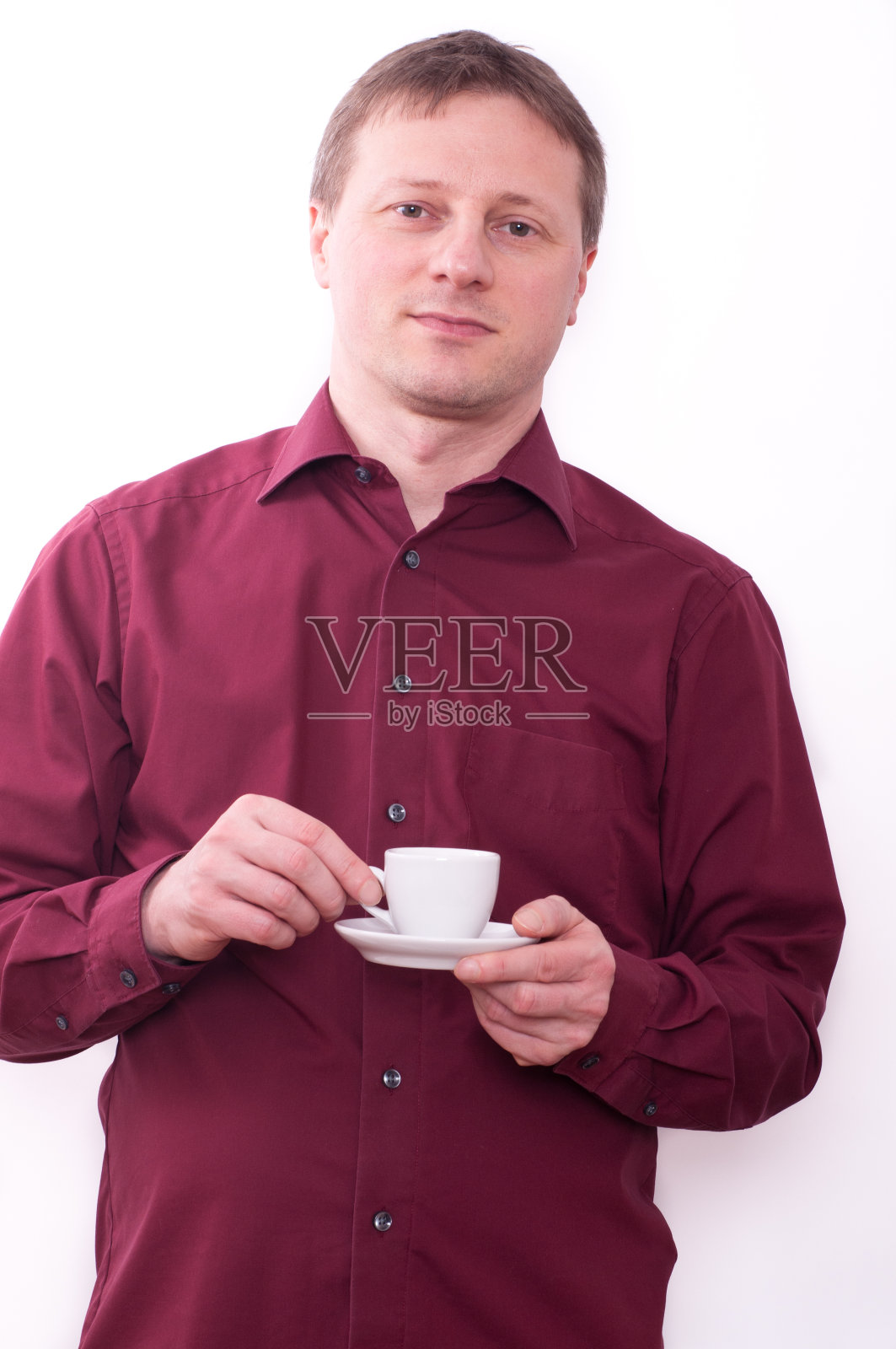 男人拿着一杯浓咖啡照片摄影图片