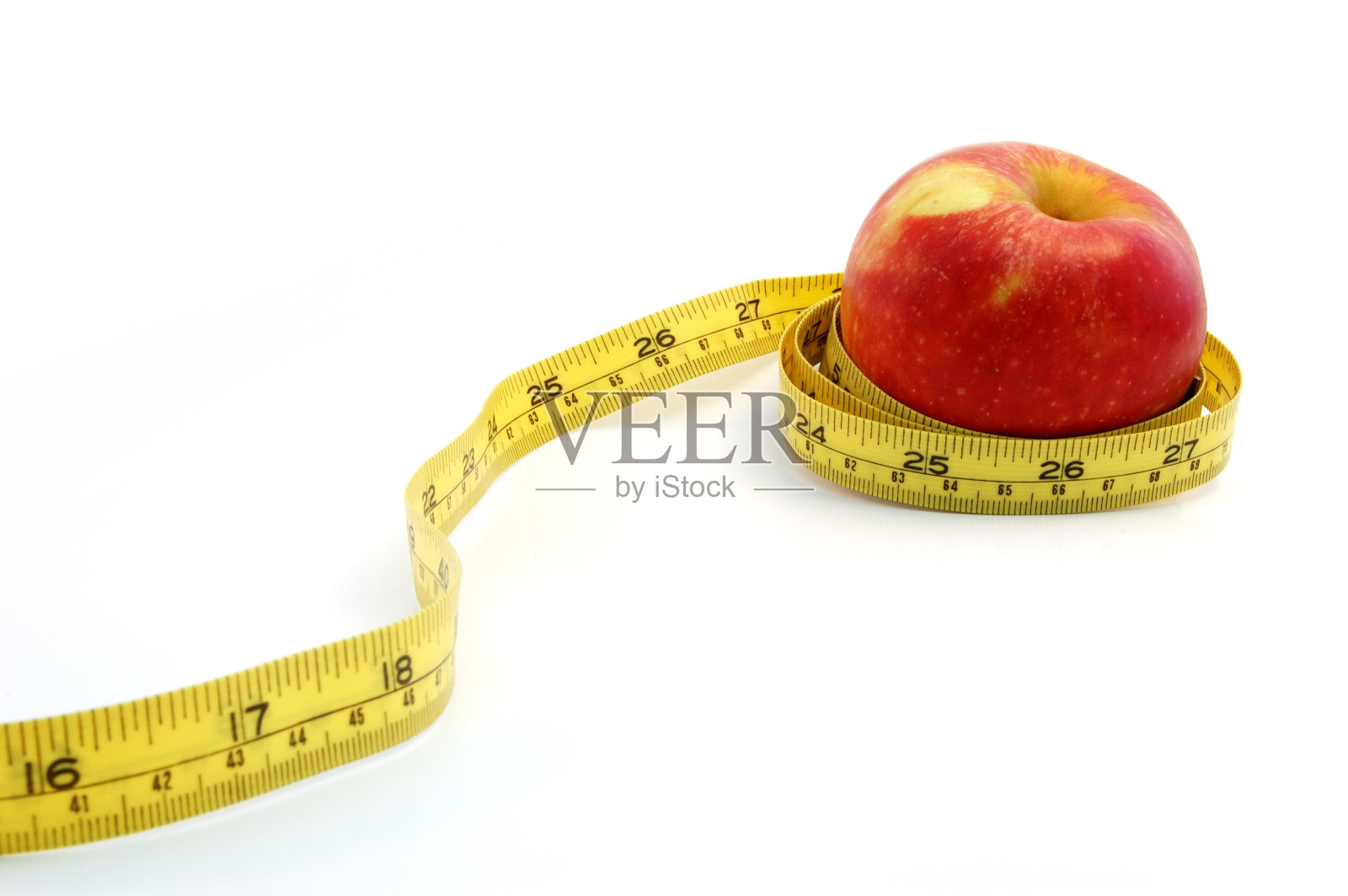 带卷尺的苹果照片摄影图片