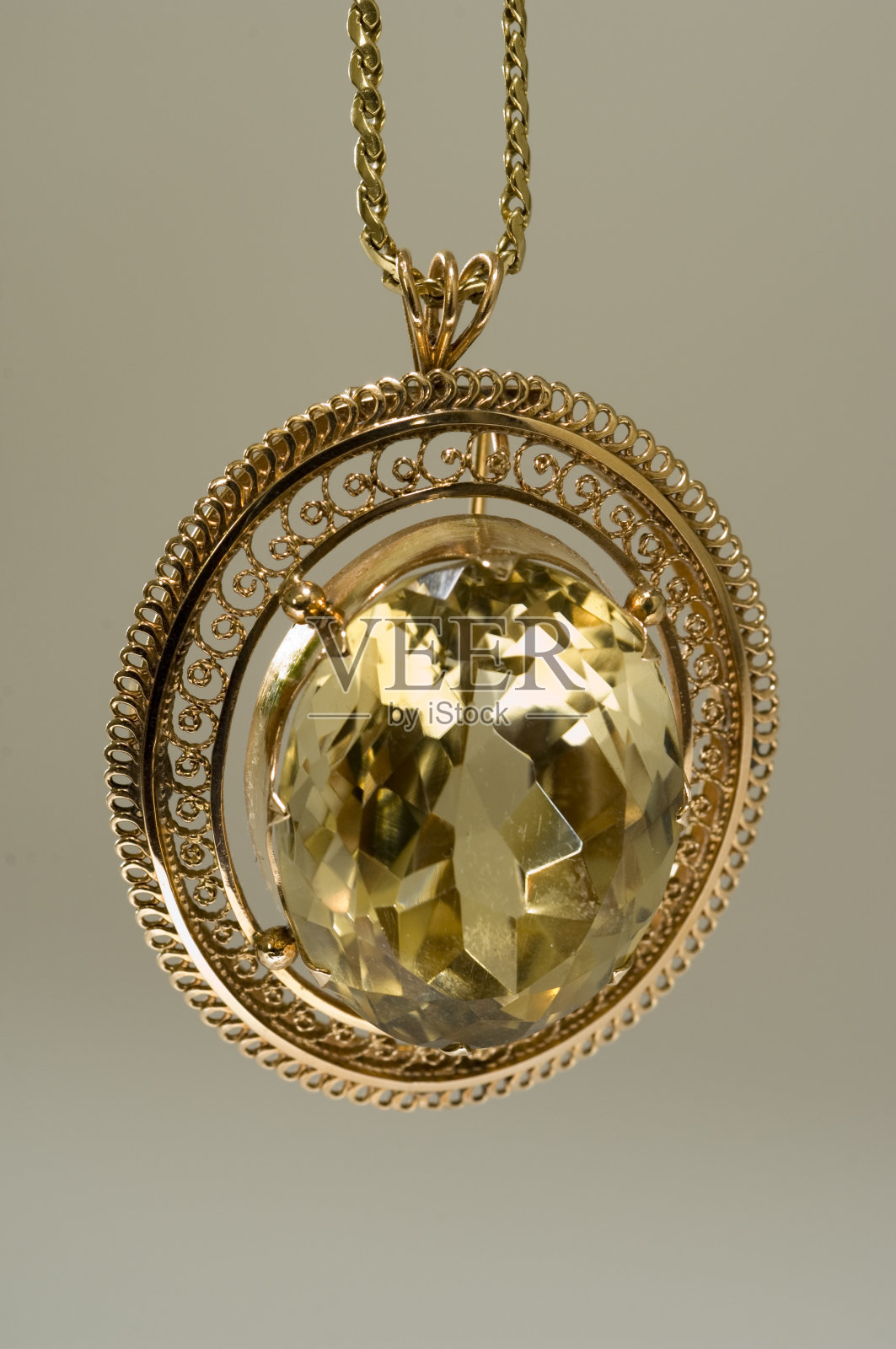 黄金黄水晶吊坠照片摄影图片