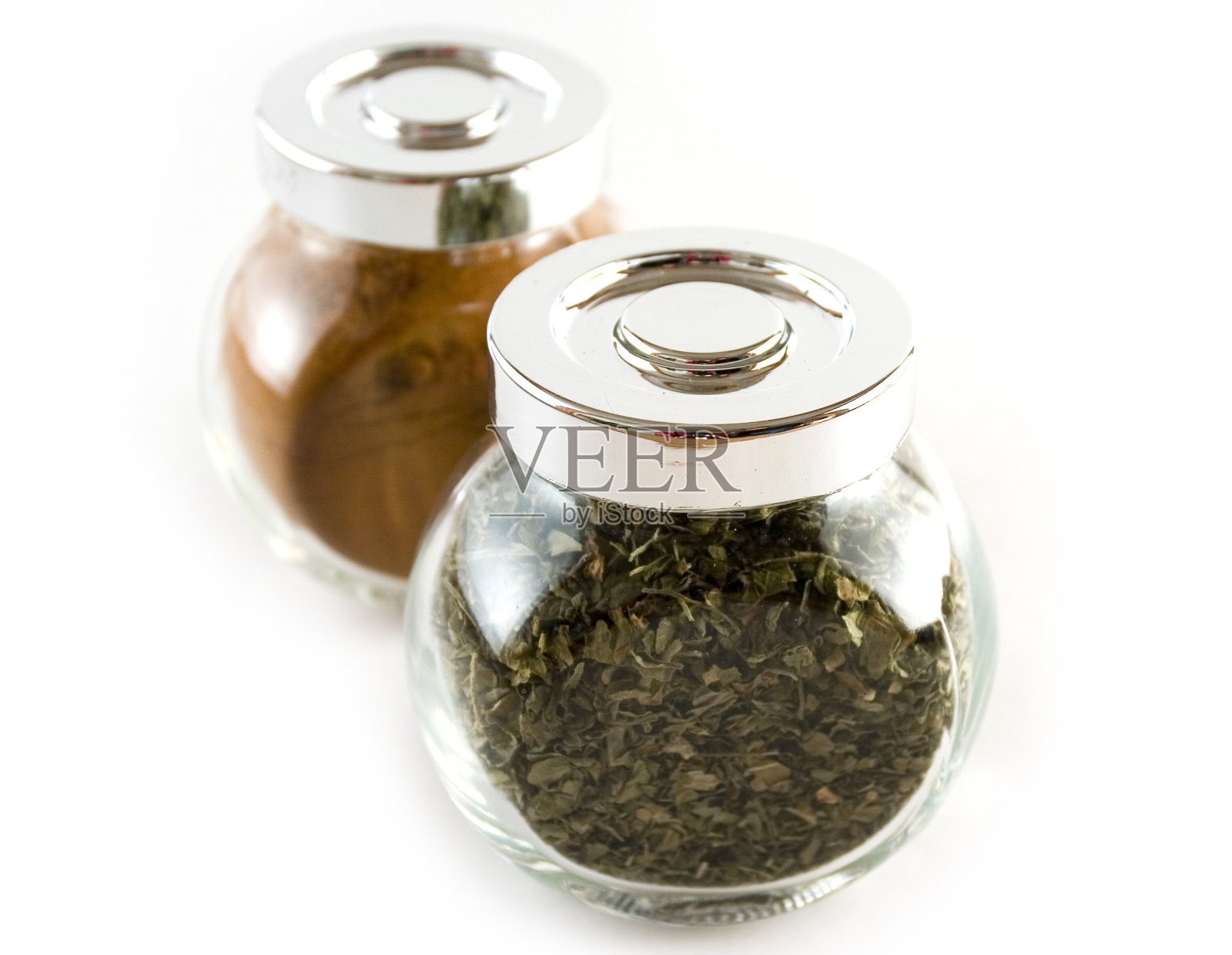 肉桂和牛至坛子照片摄影图片