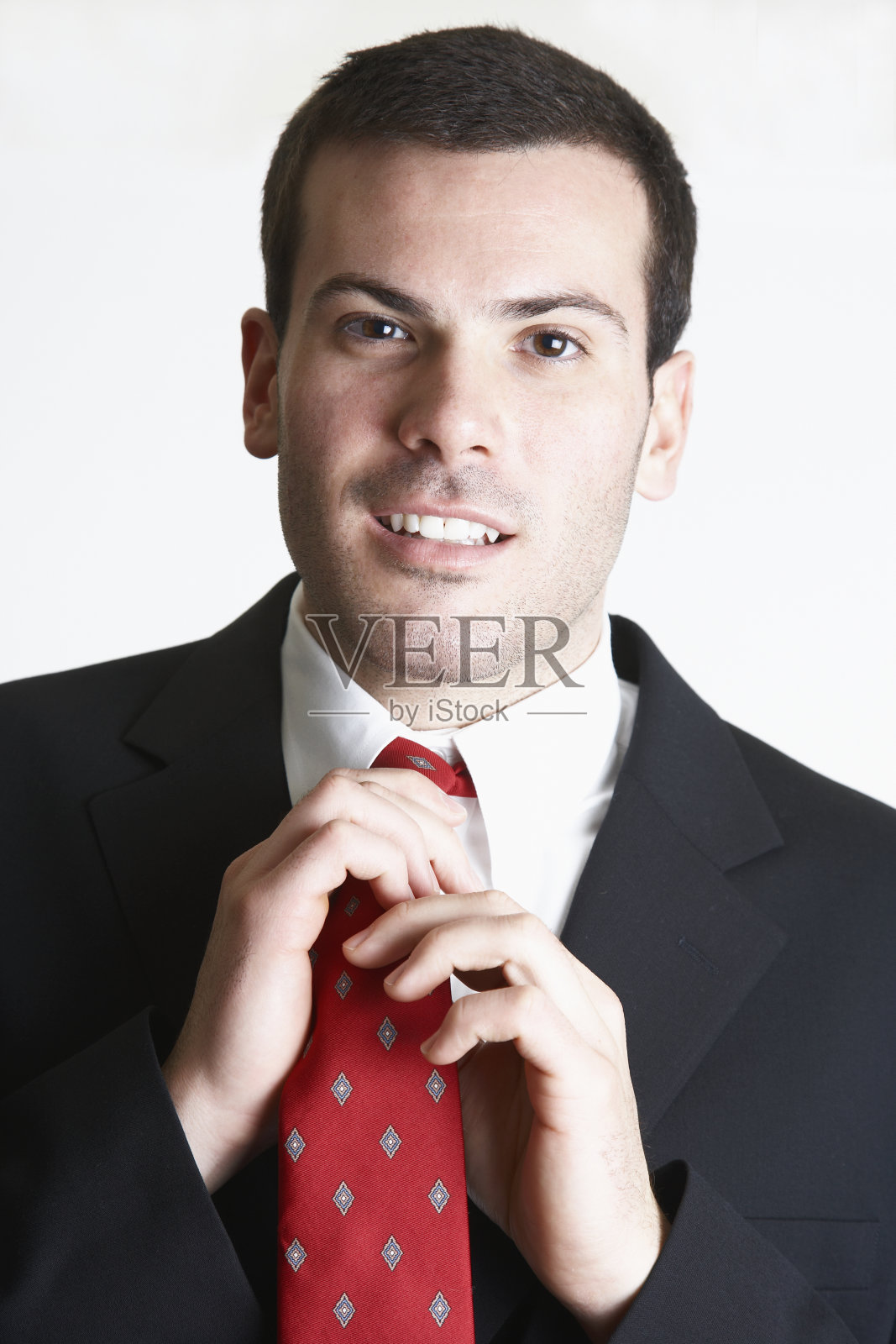 商人调整领带照片摄影图片