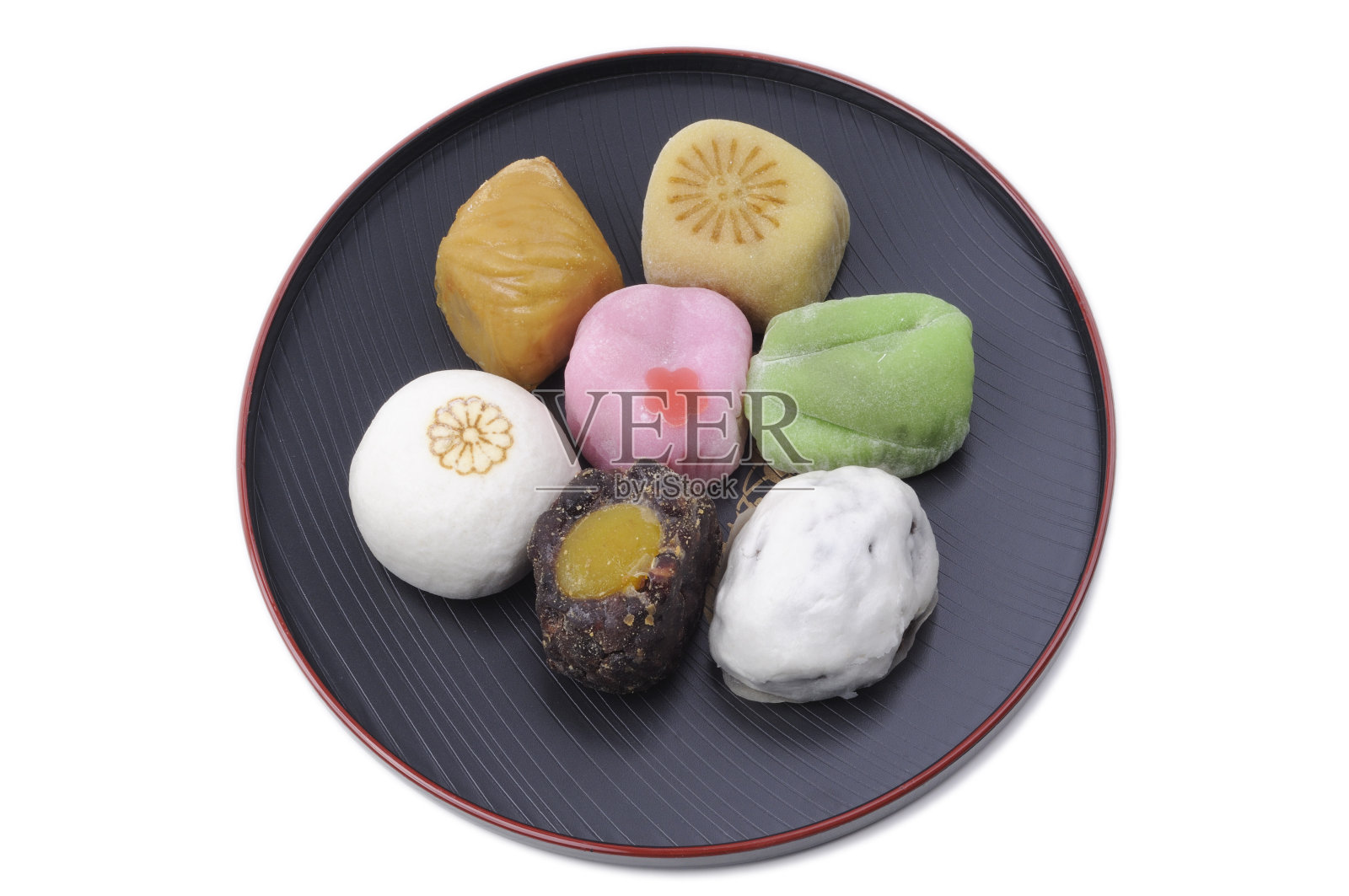 麻糬品种在黑色板上照片摄影图片