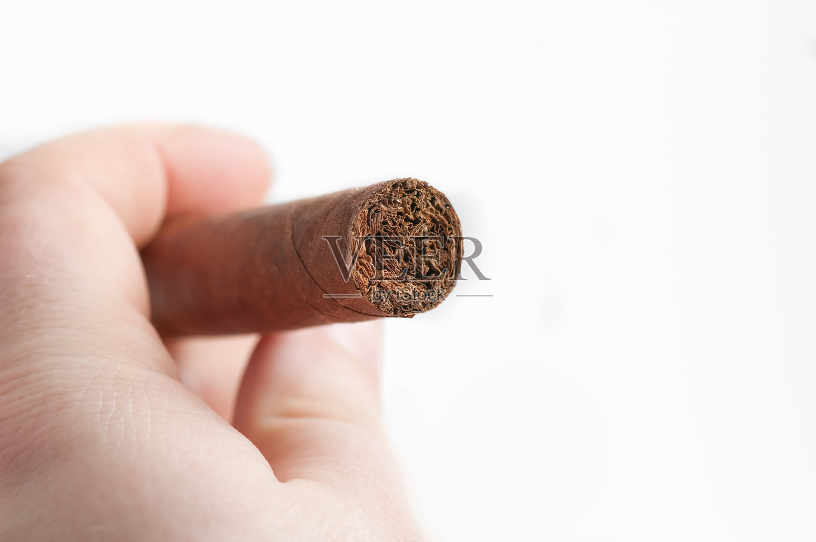 拿着雪茄照片摄影图片