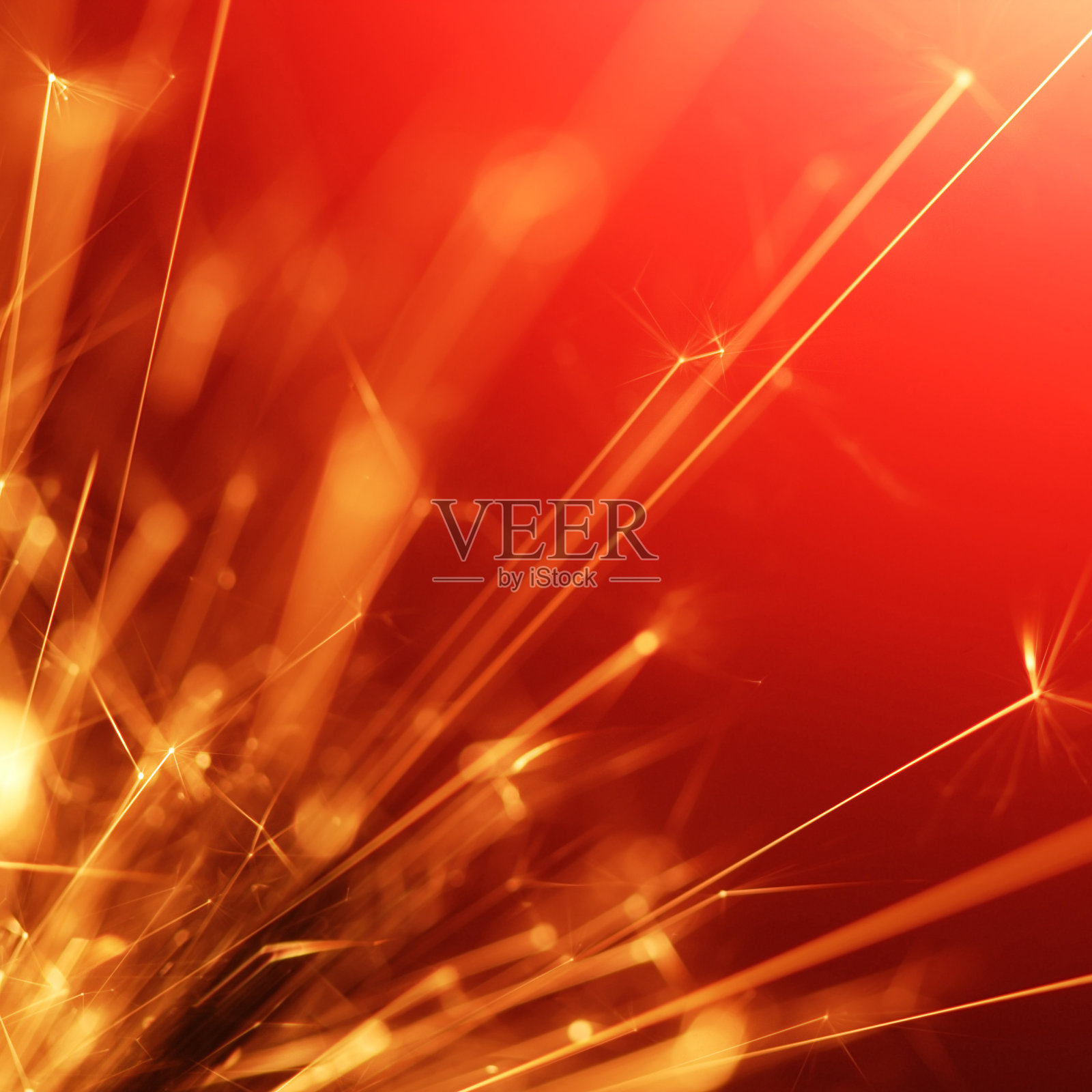 红色的背景和橙色的火花照片摄影图片