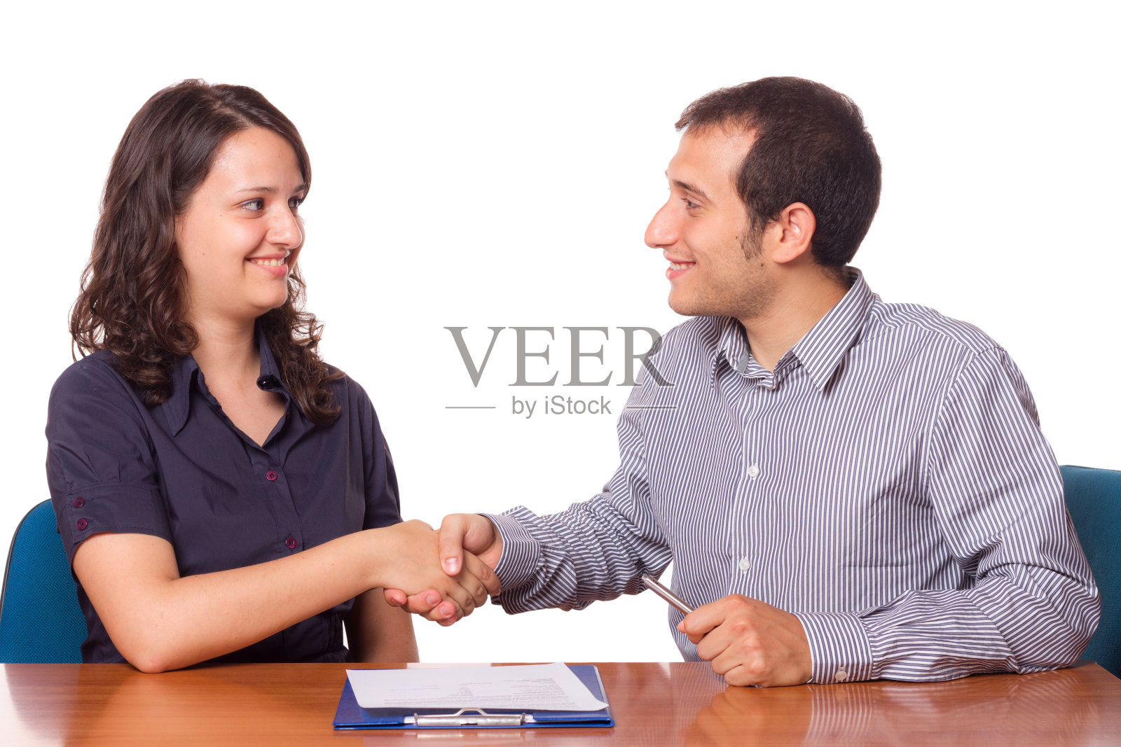 男人和女人握手，商业主题照片摄影图片