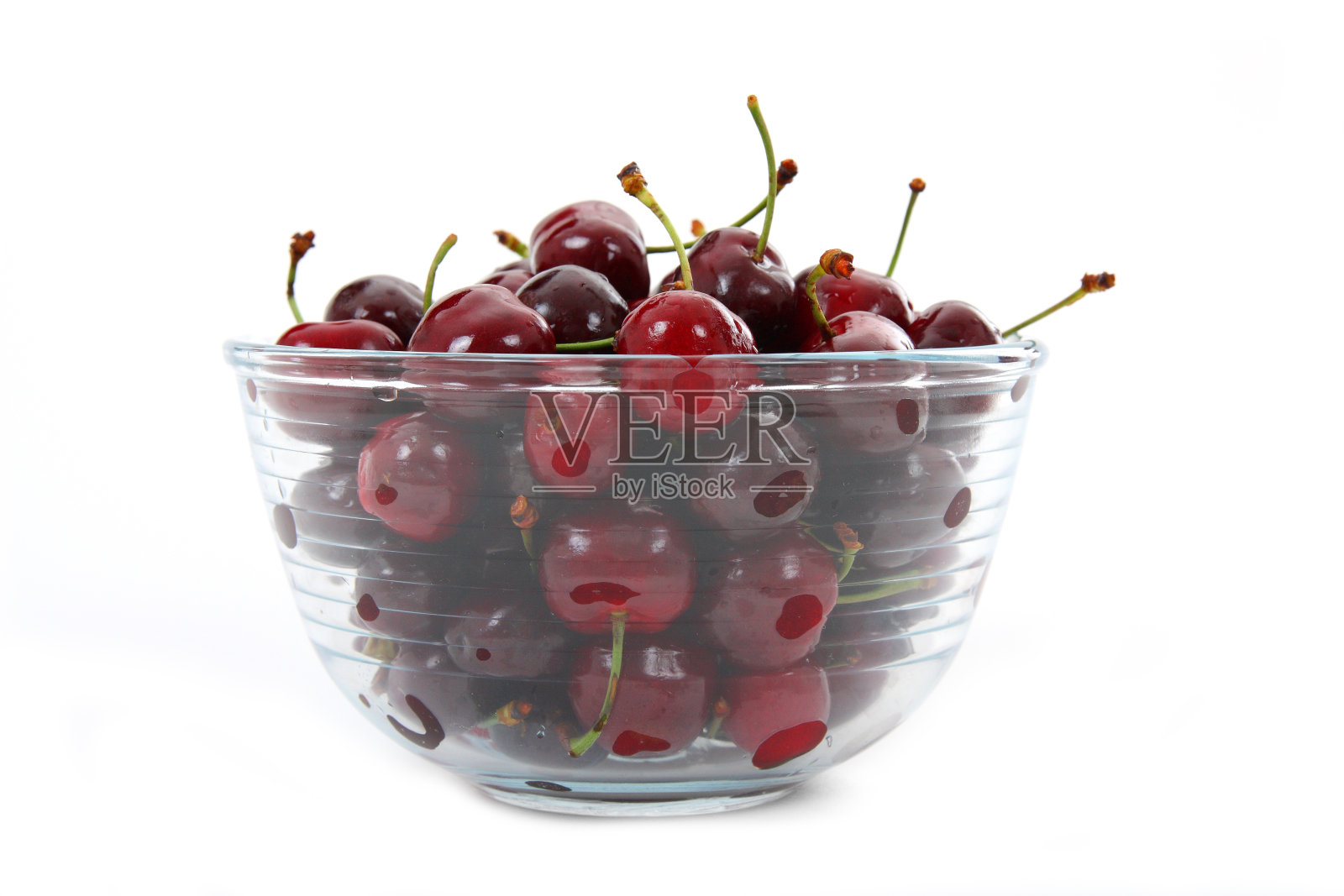玻璃碗上的樱桃照片摄影图片