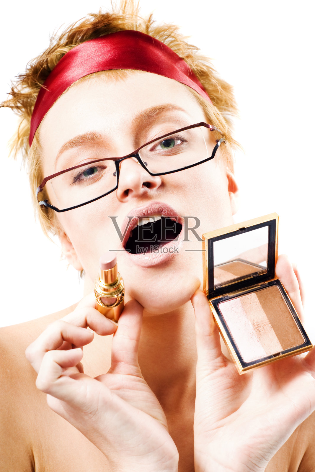 有口红和镜子的美女照片摄影图片