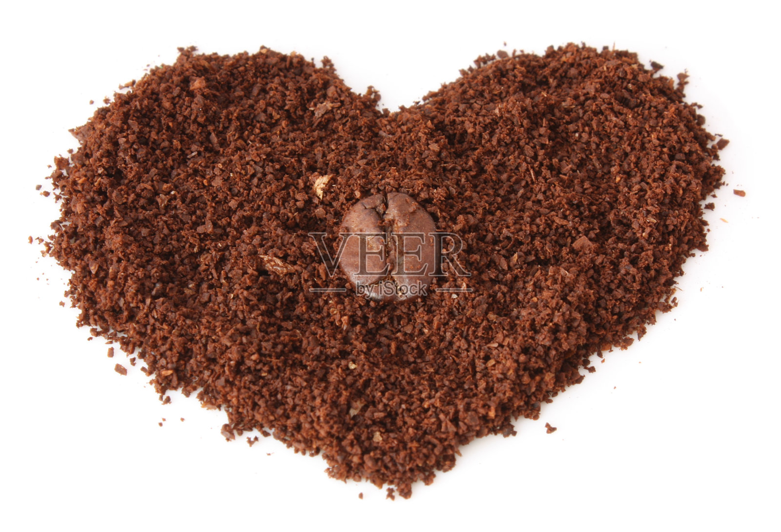 心来自磨碎的咖啡和豆子照片摄影图片