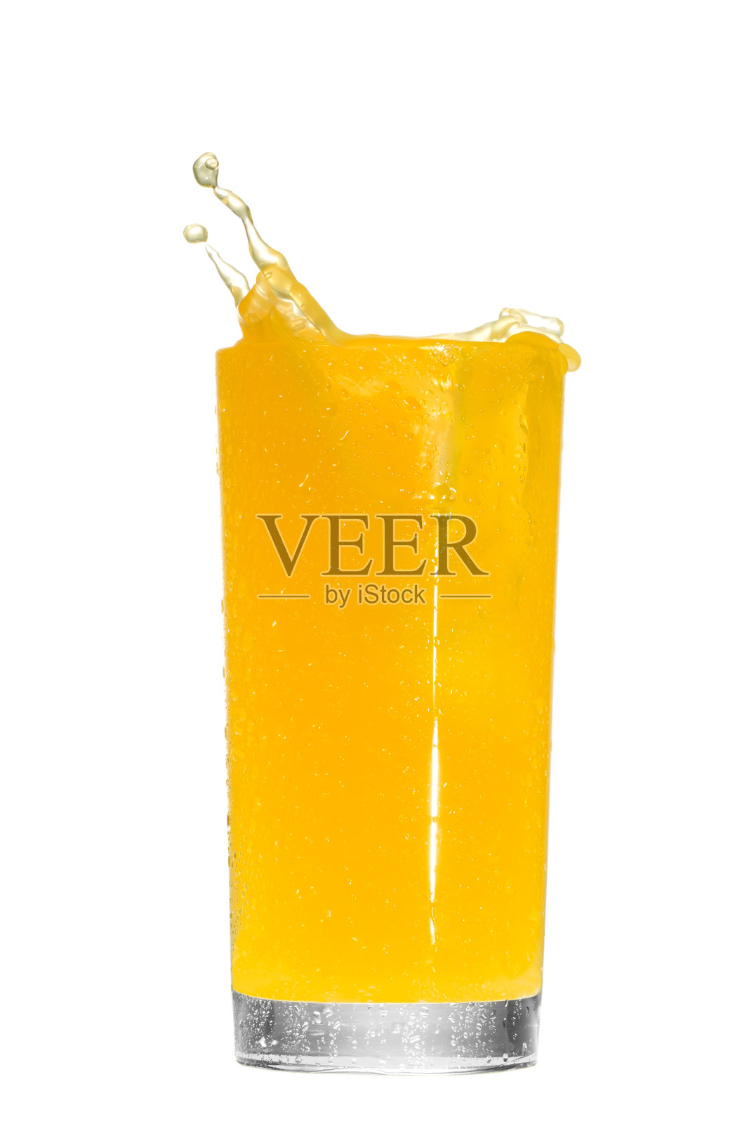 橙汁溅在白色上照片摄影图片