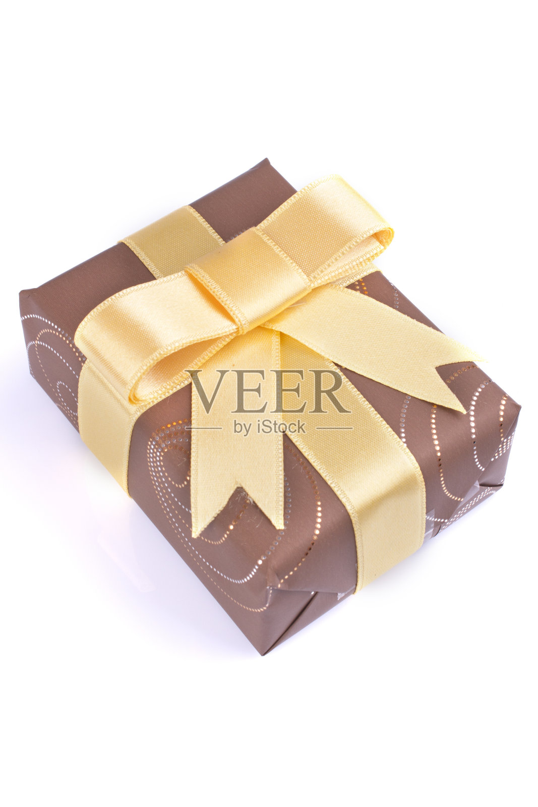 带黄色丝带的棕色礼盒照片摄影图片