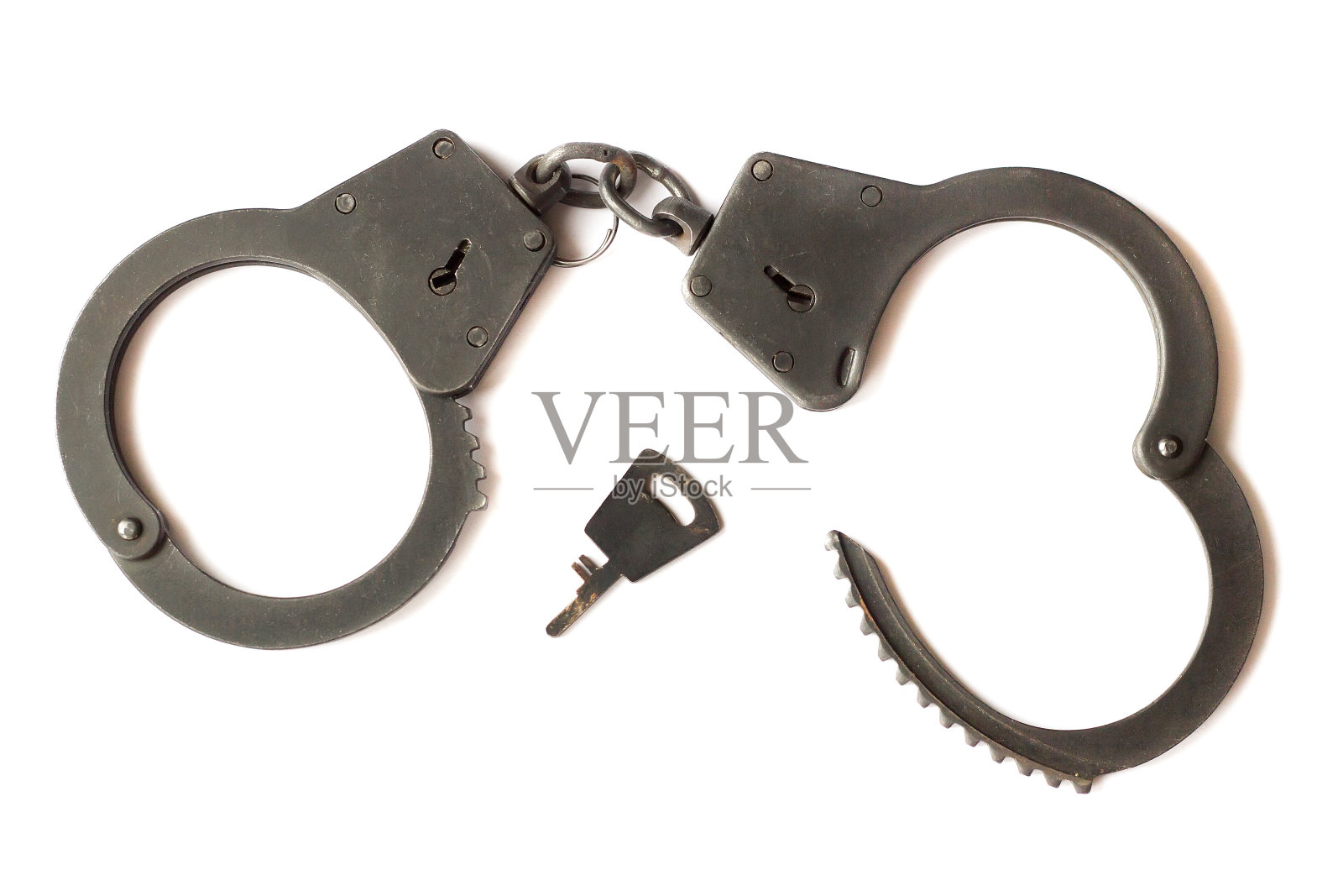 手铐在白色隔离照片摄影图片