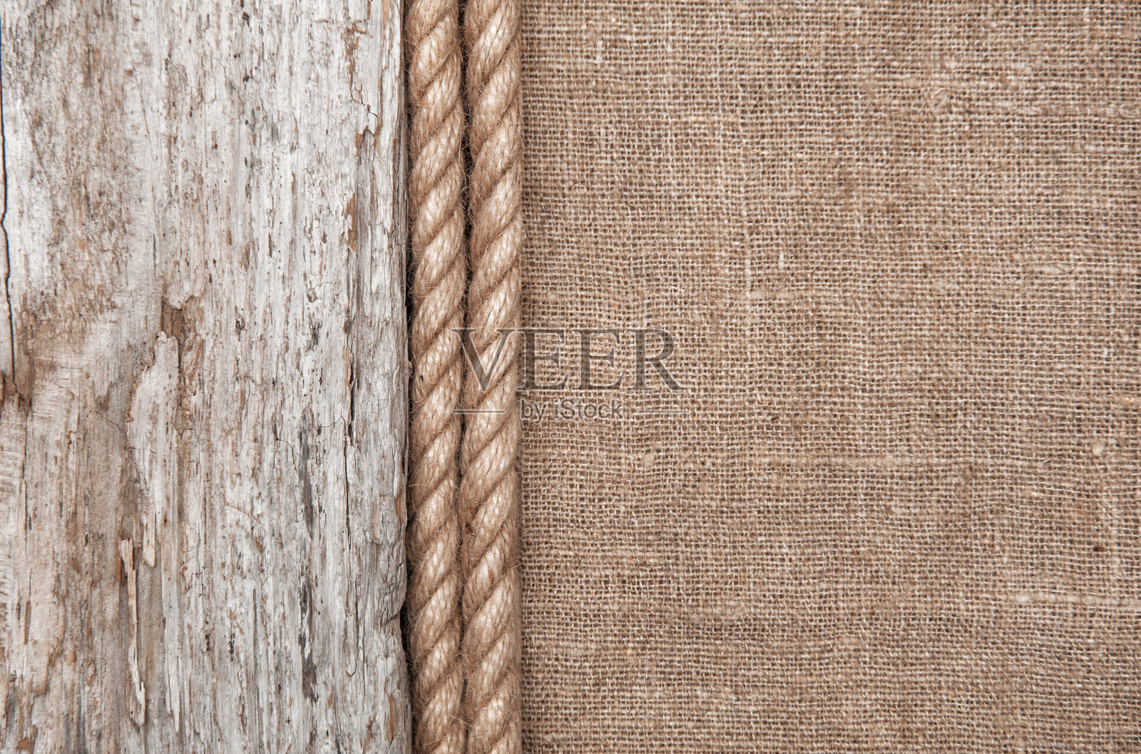 粗麻布背景由绳子和旧木材边界照片摄影图片