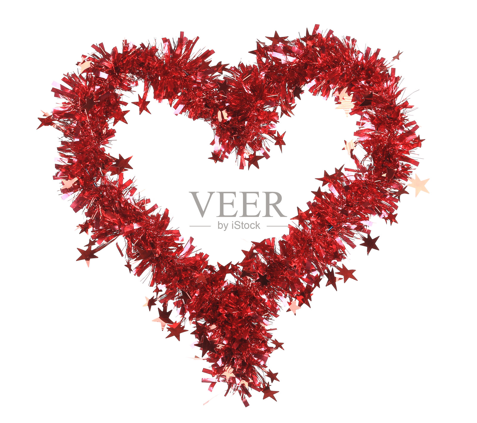 圣诞的红色金箔，以星星为心。照片摄影图片