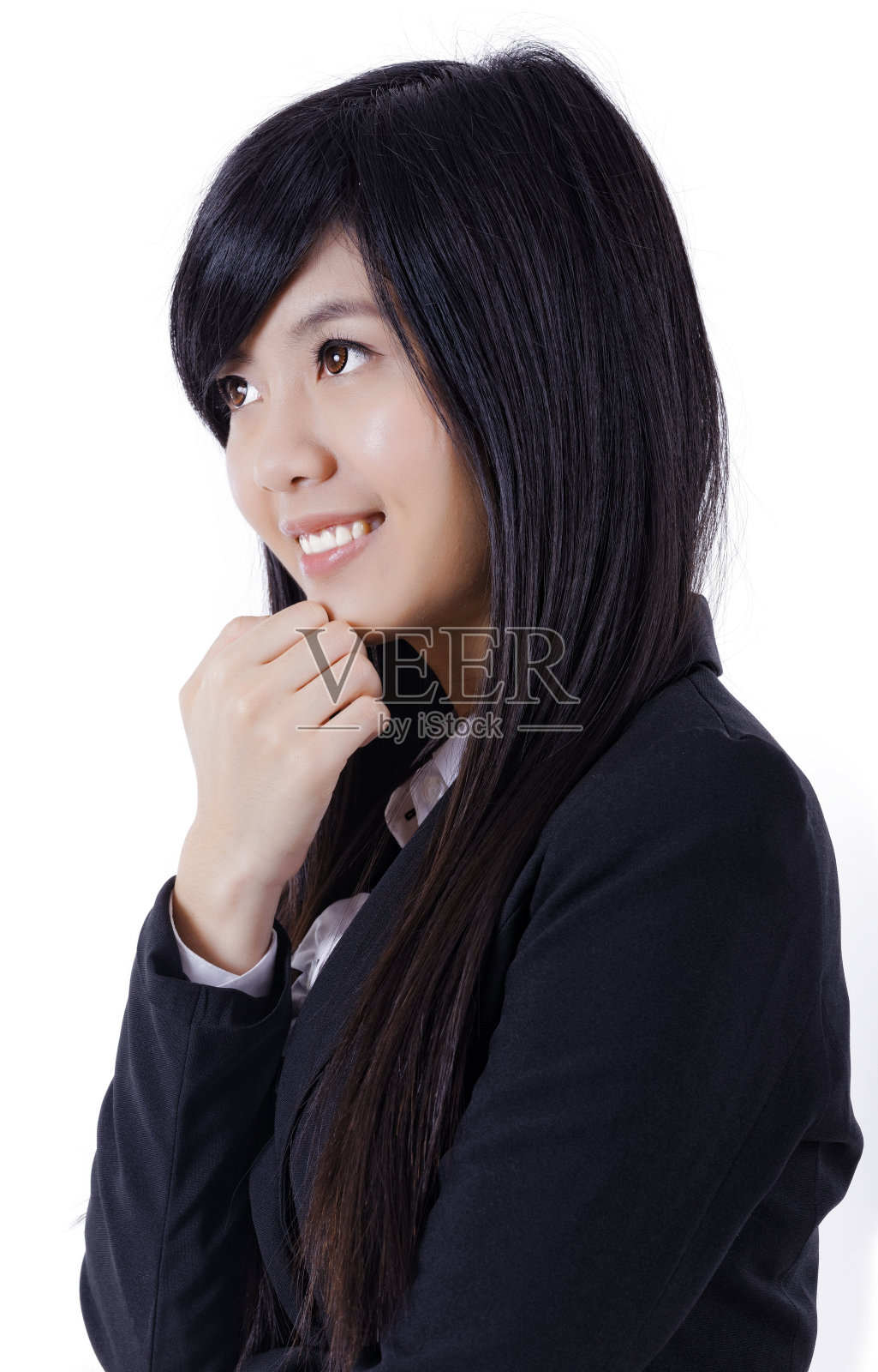 亚洲漂亮女孩微笑的脸，看向左边照片摄影图片