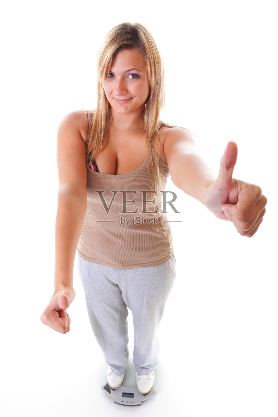 体重超标的女人庆祝减肥成功照片摄影图片