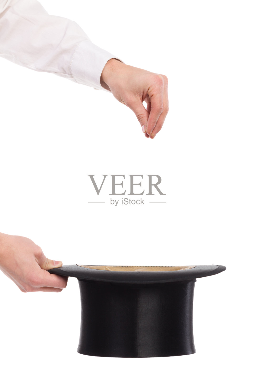 魔术师的手里。照片摄影图片