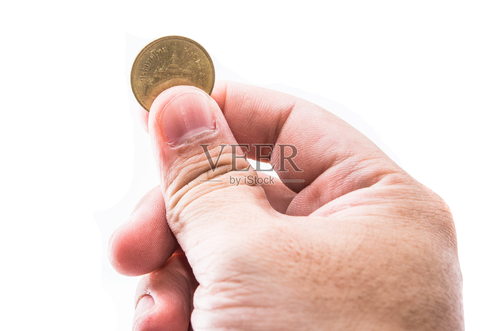 硬币上的手照片摄影图片