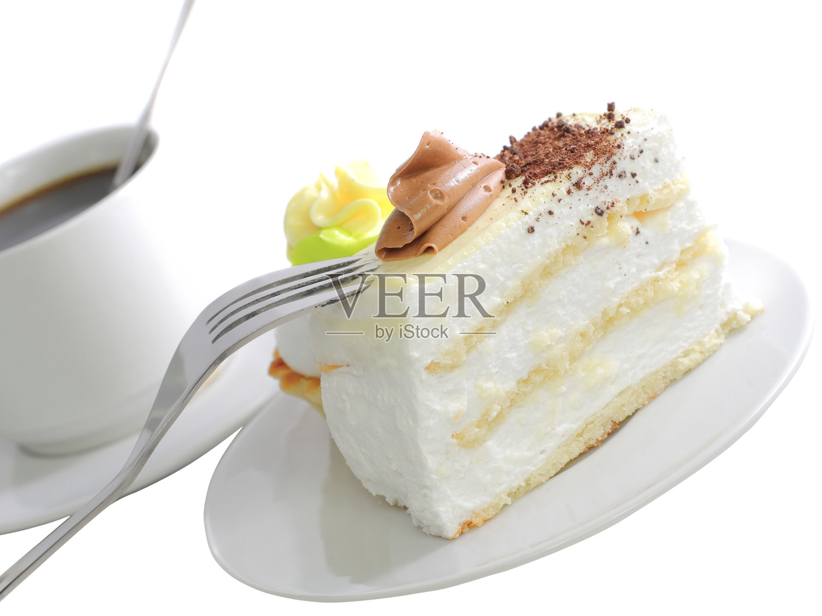 海绵蛋糕和一杯咖啡。孤立的照片摄影图片