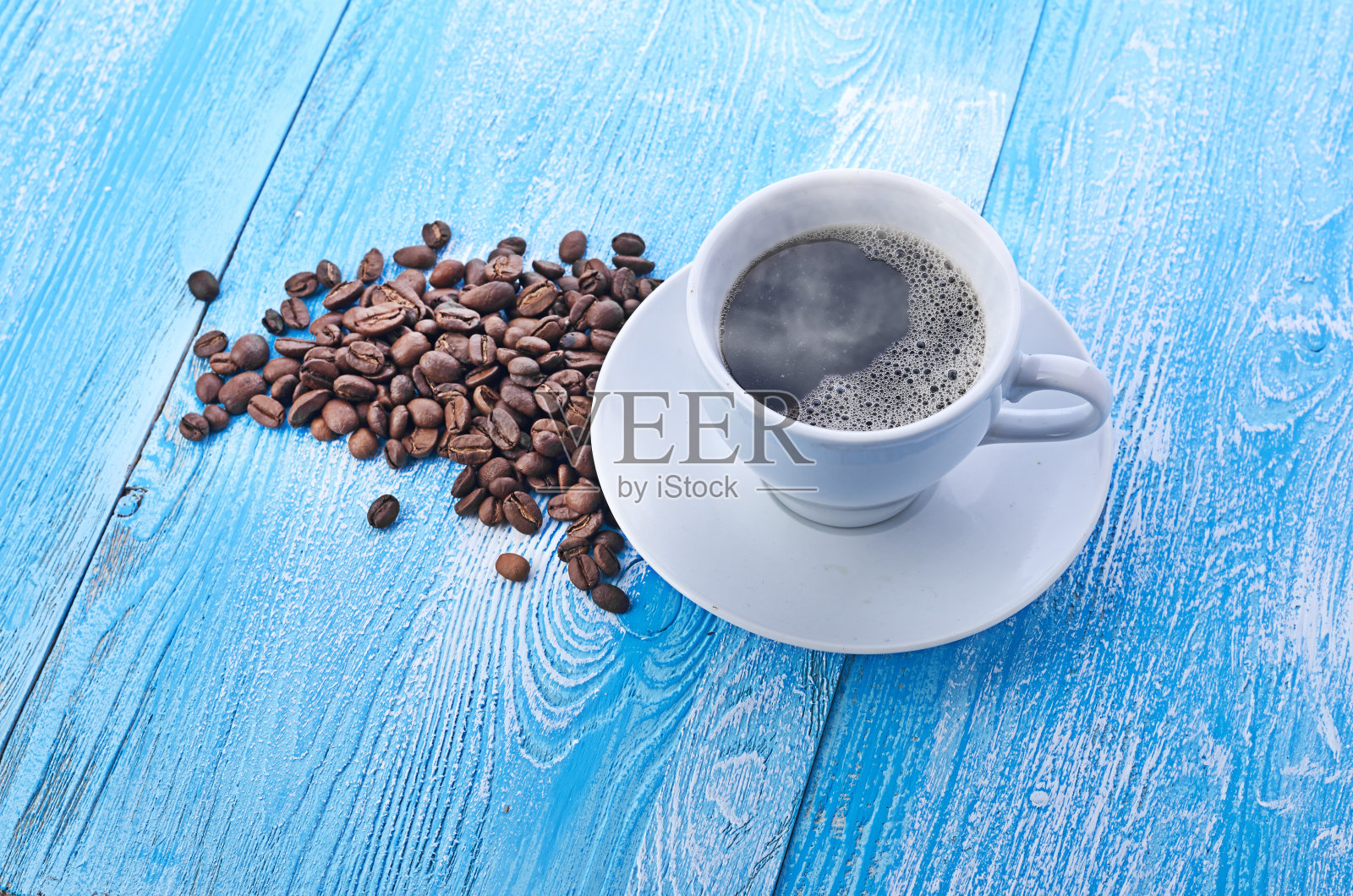 咖啡杯和豆子照片摄影图片